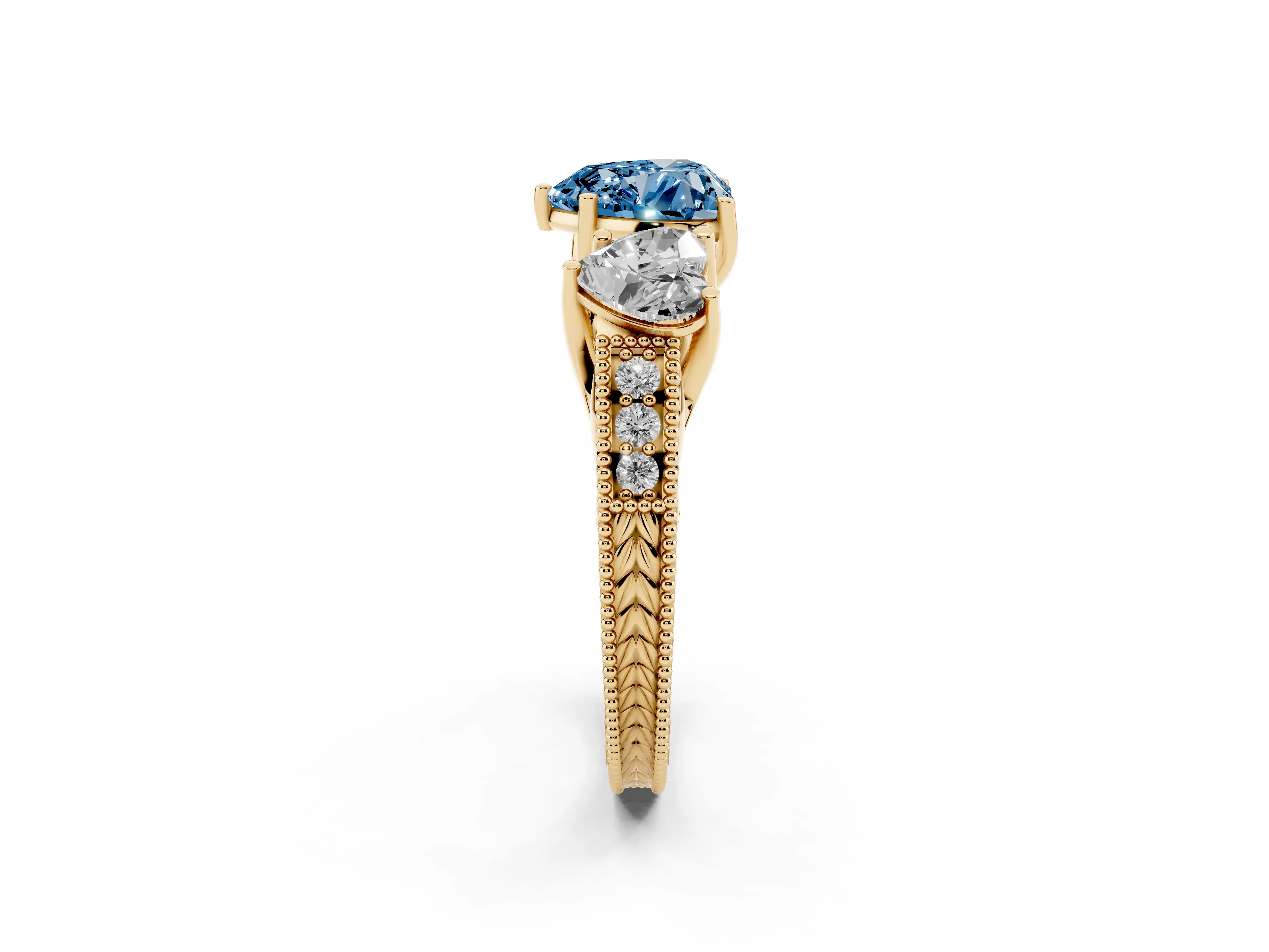 Fancy Blue Heart Cut Diamond Three-Stone Engagement Ring Set in Yellow gold with Milgrain Pavé Band