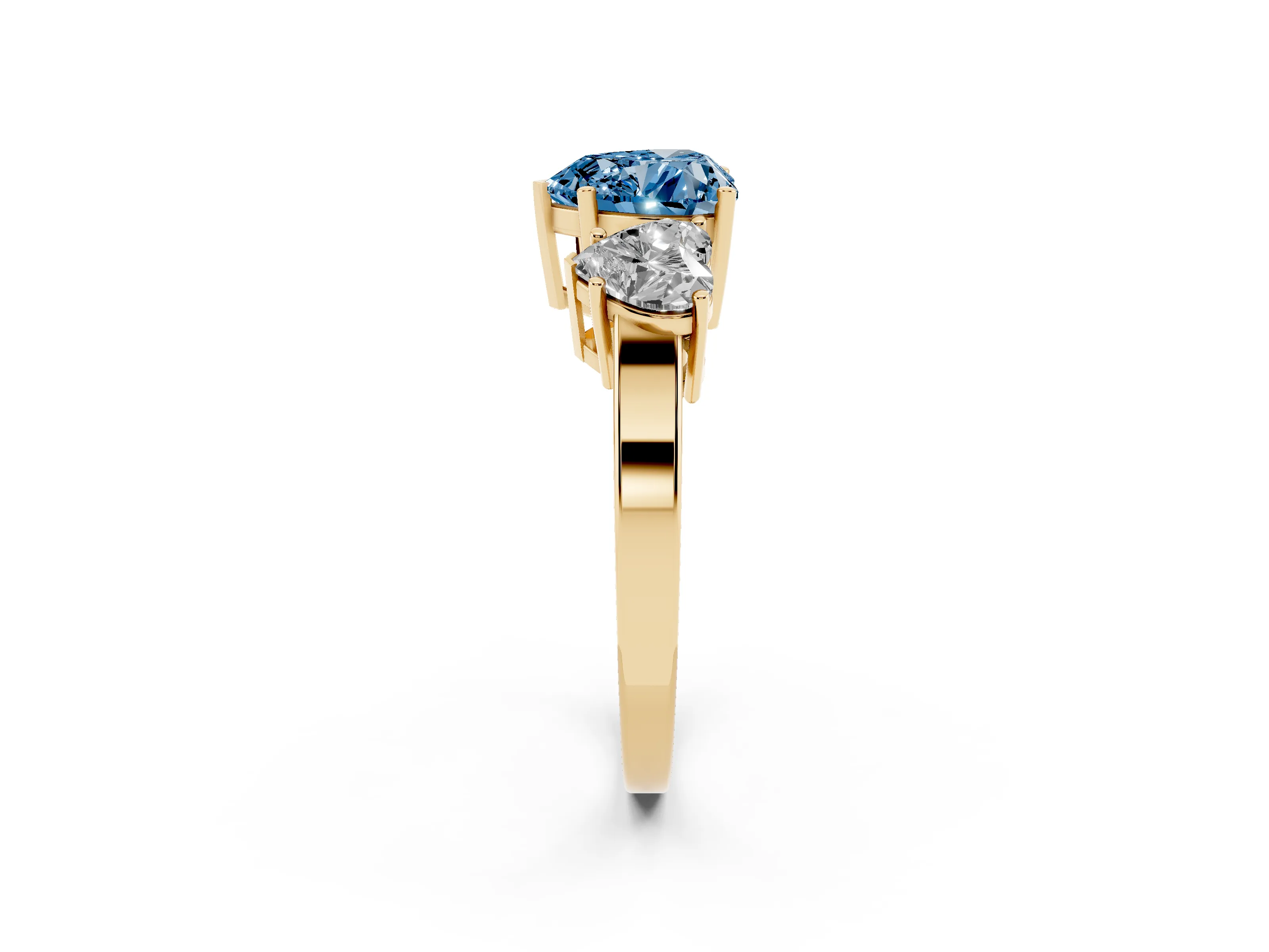 Fancy Blue Heart Cut Diamond Three-Stone Engagement Ring Set in Yellow gold with Flat Band