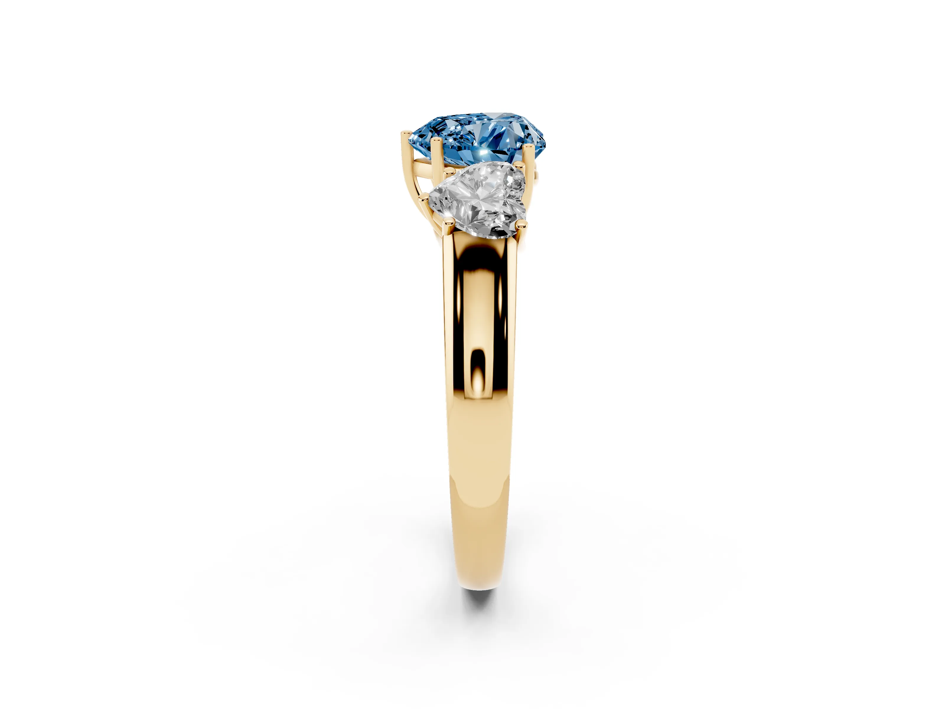 Fancy Blue Three-Stone Heart Cut Diamond Ring Set in Yellow gold with Matching Prong Settings and Plain Band