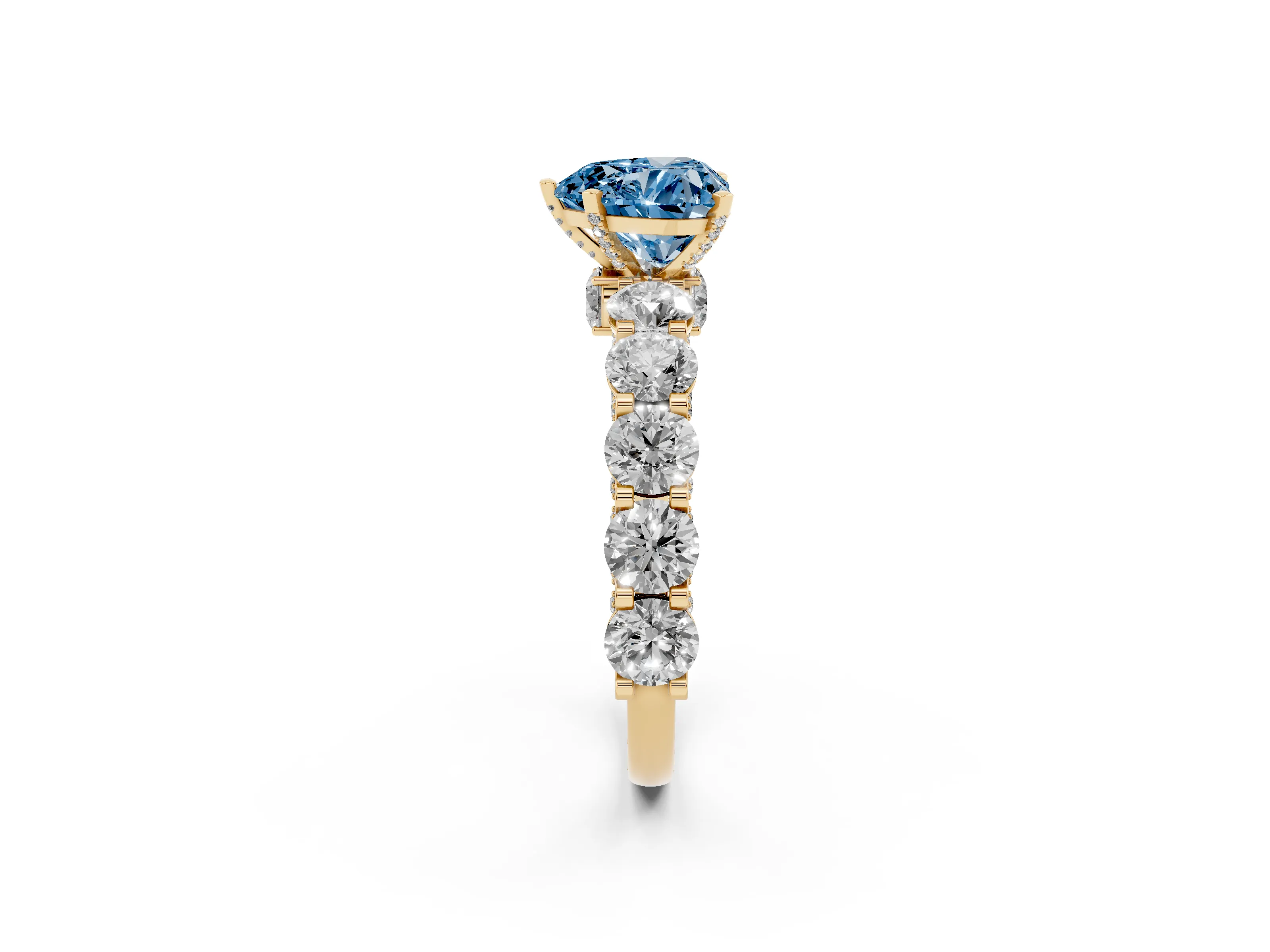 Fancy Blue Heart Cut Diamond Side Stone Ring Set in Yellow gold with Alternating Round and Oval Side Stones