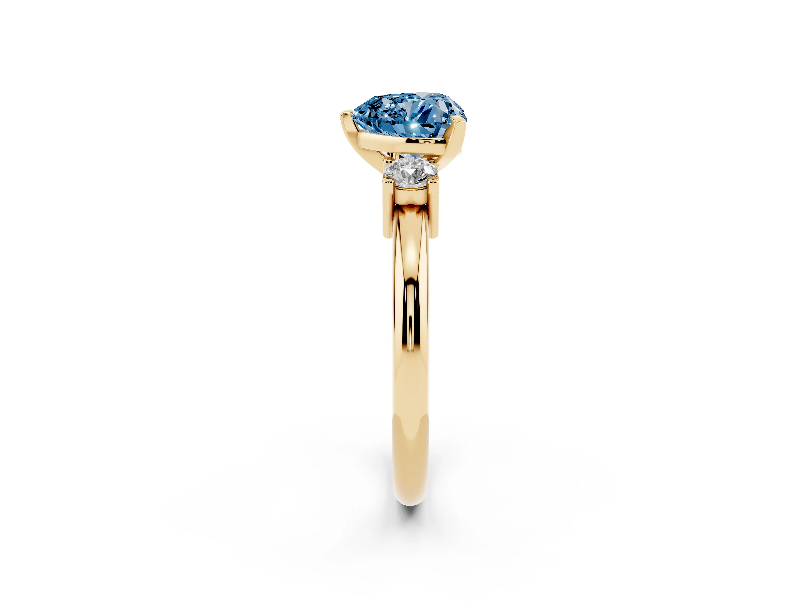 Fancy Blue Three-Stone Heart Cut Diamond Ring Set in Yellow gold with Prong Setting and Plain Band