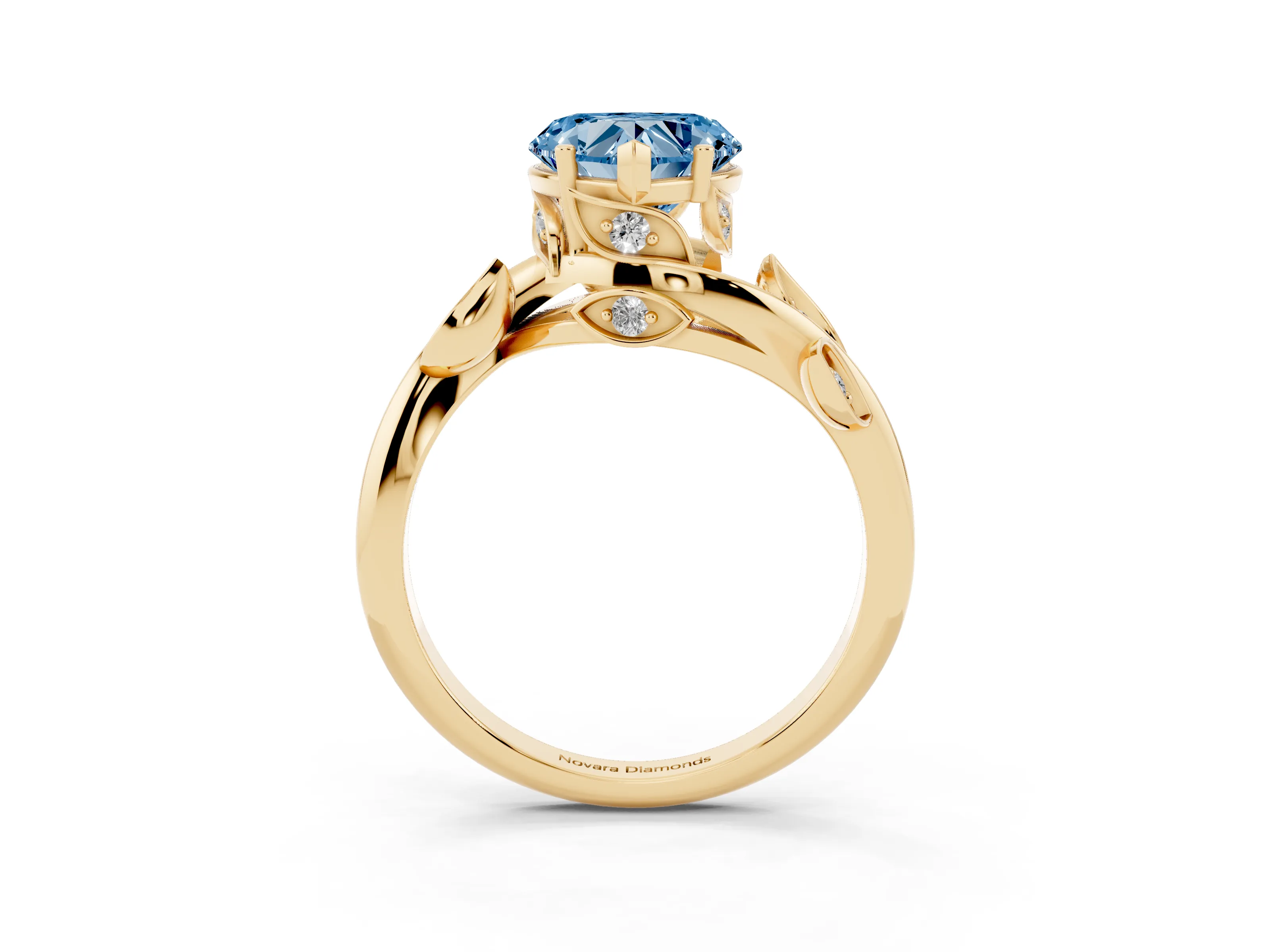 Fancy Blue Heart Cut Diamond Solitaire Twist Engagement Ring Set in Yellow gold with Pavé Leaf Accents