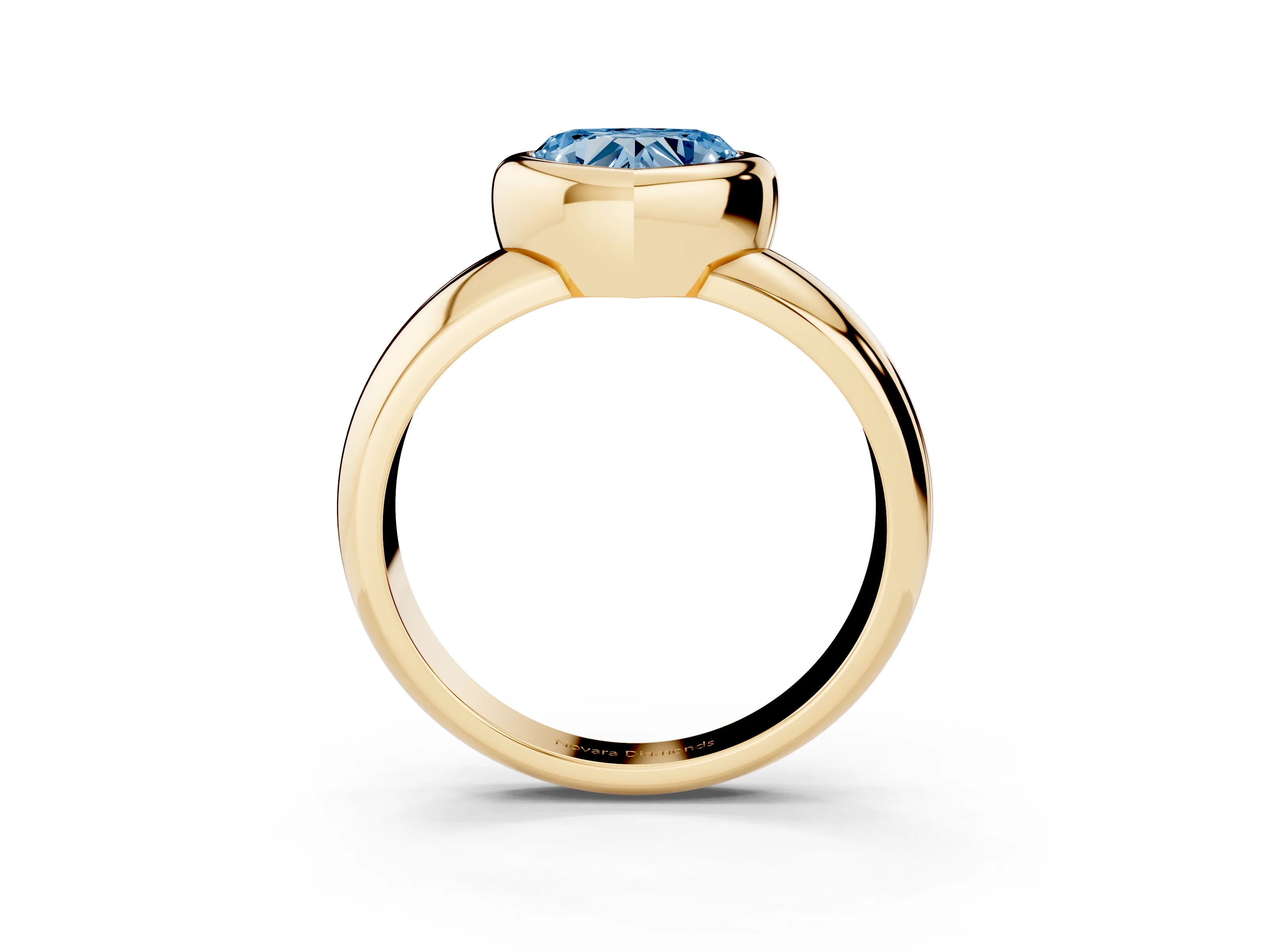 Fancy Blue Bezel Set Heart Cut Diamond Solitaire Ring Set in Yellow gold with Wide Band