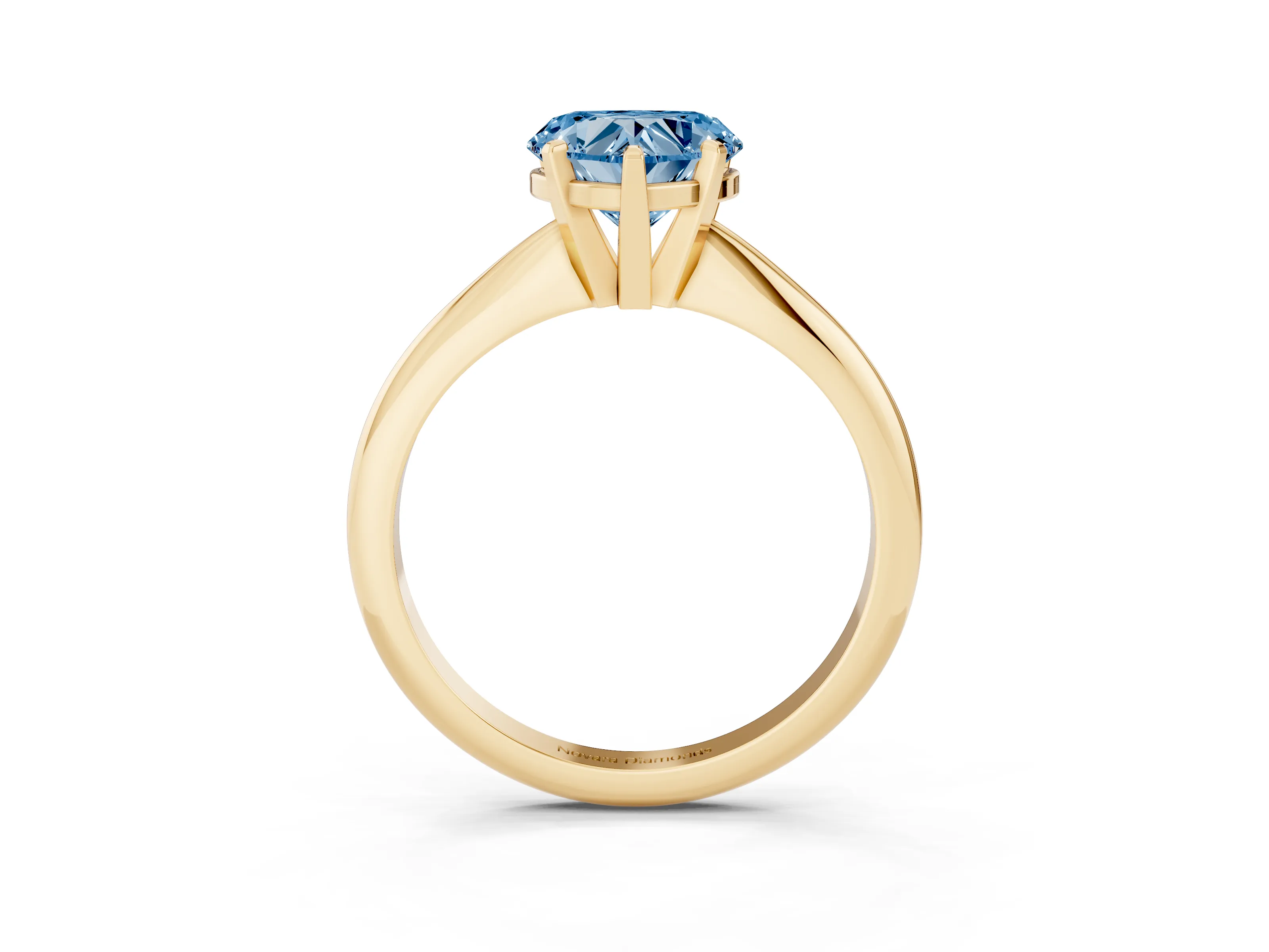 Fancy Blue Heart Cut Diamond Solitaire Ring Set in Yellow gold with Prong Setting on a Plain Round Band