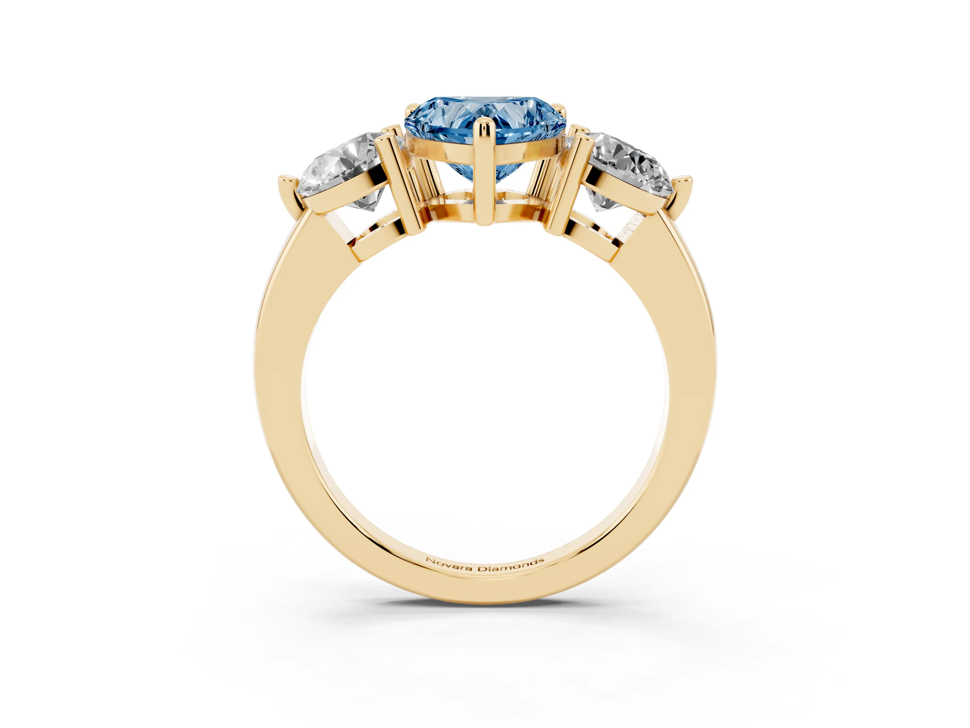 Fancy Blue Heart Cut Diamond Three-Stone Ring Set in Yellow gold with Prong Setting and Classic Band