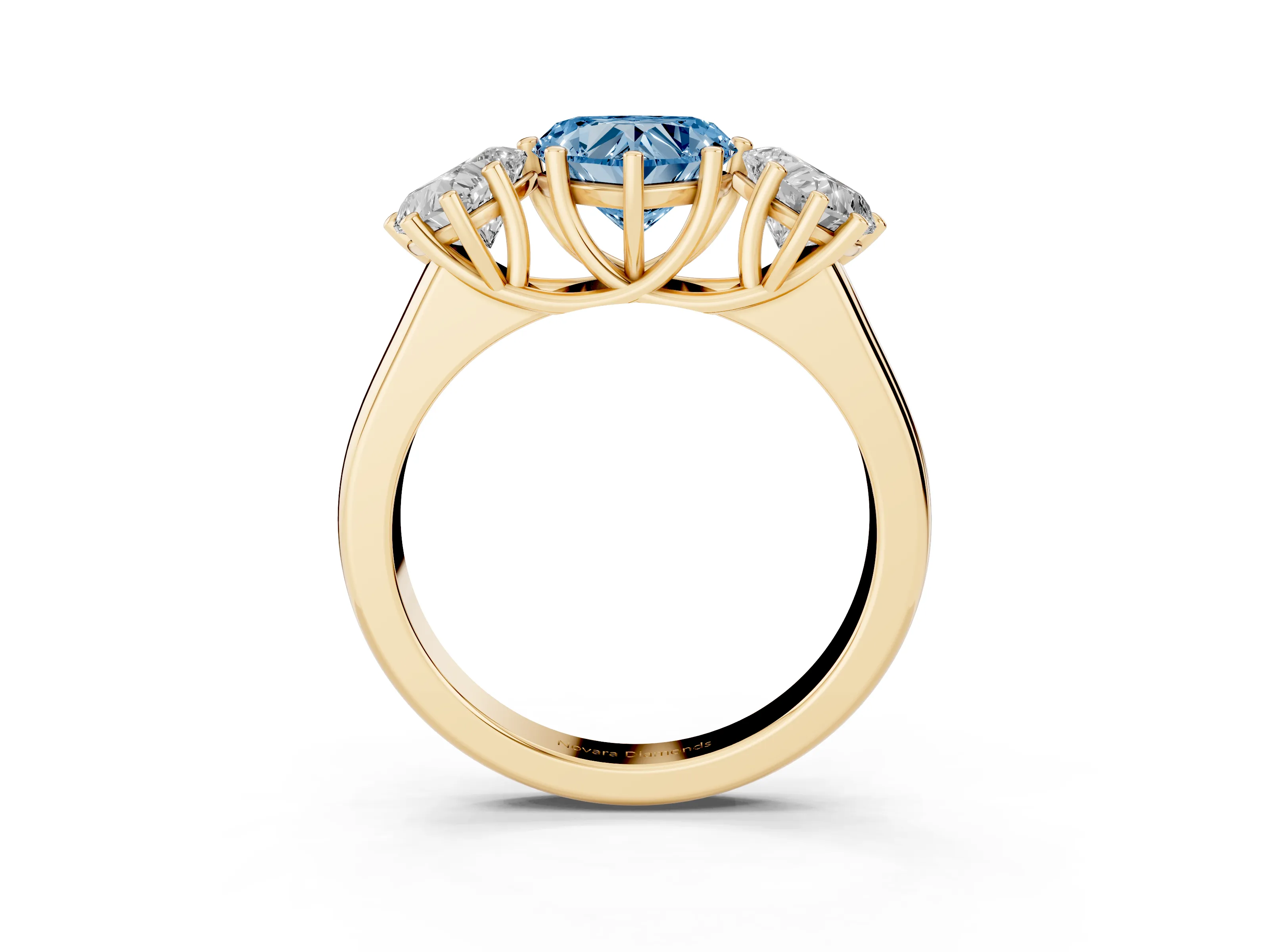 Fancy Blue Heart Cut Diamond Three-Stone Ring Set in Yellow gold with Plain Polished Band
