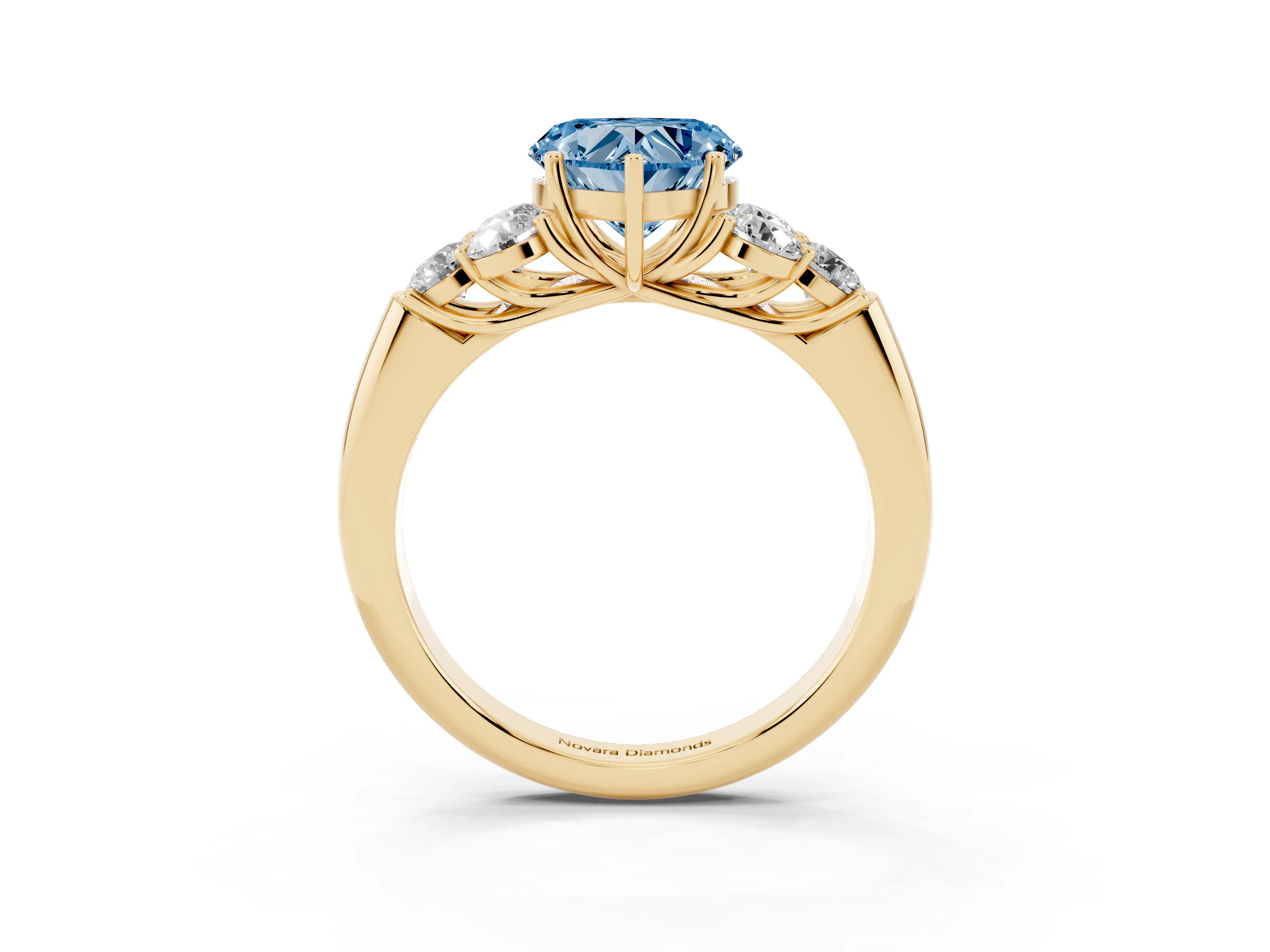 Fancy Blue Heart Cut Diamond Cluster Ring Set in Yellow gold with Round Accent Stones and Prong Setting on a Plain Band