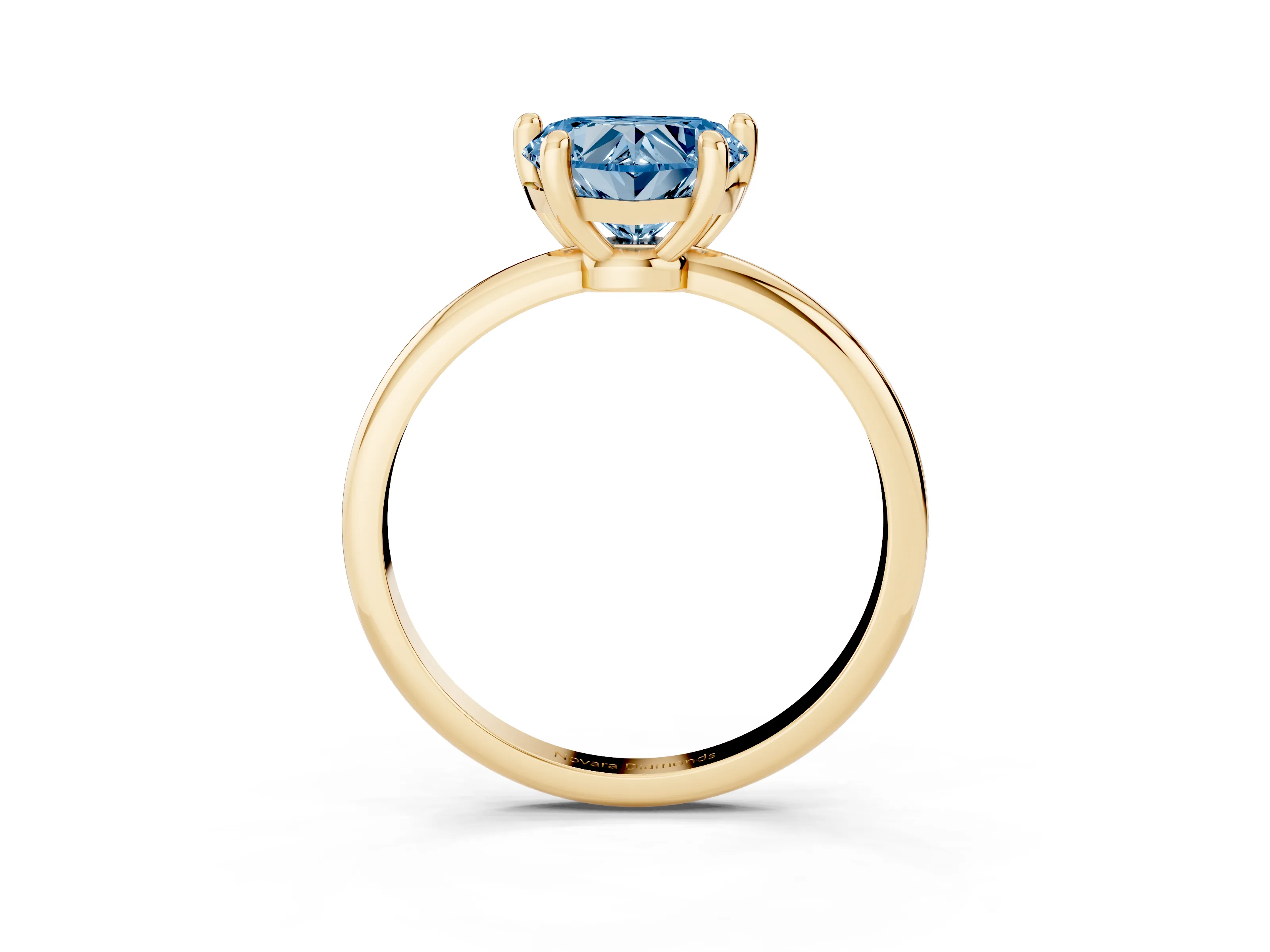 Fancy Blue Heart Cut Diamond Solitaire Ring Set in Yellow gold with Secure Prong Setting on a Classic Band