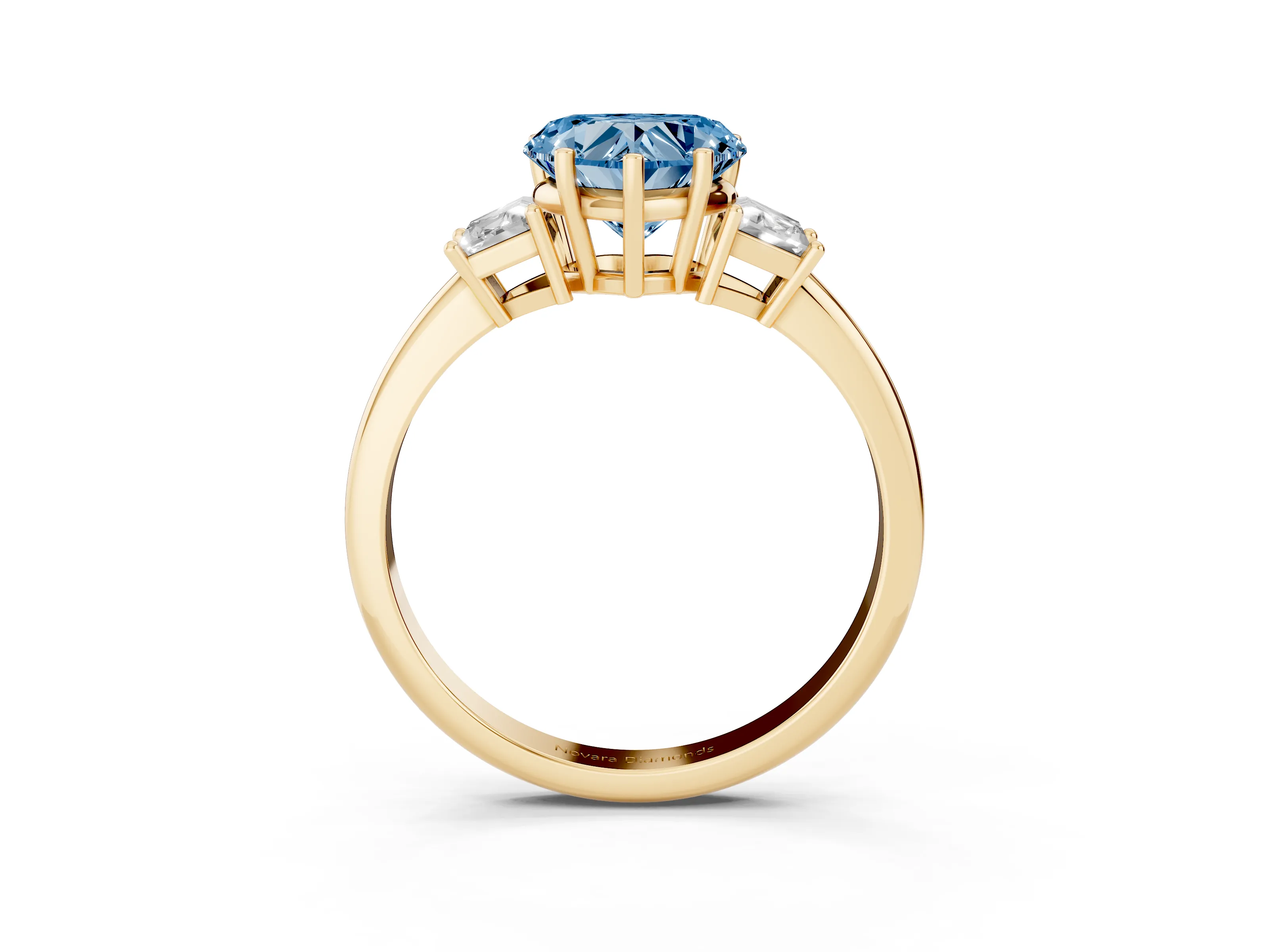 Fancy Blue Heart Cut Diamond Three-Stone Ring Set in Yellow gold with Trapezoid Side Stones and Prong Setting