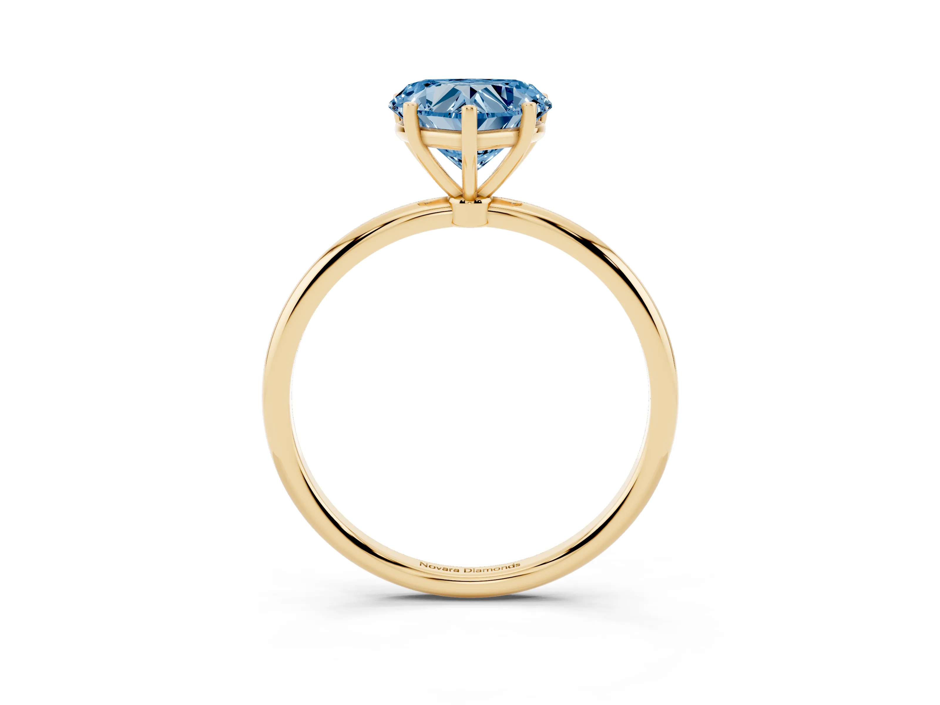 Fancy Blue Heart Cut Diamond Solitaire Engagement Ring Set in Yellow gold with Thin Band and Prong Setting
