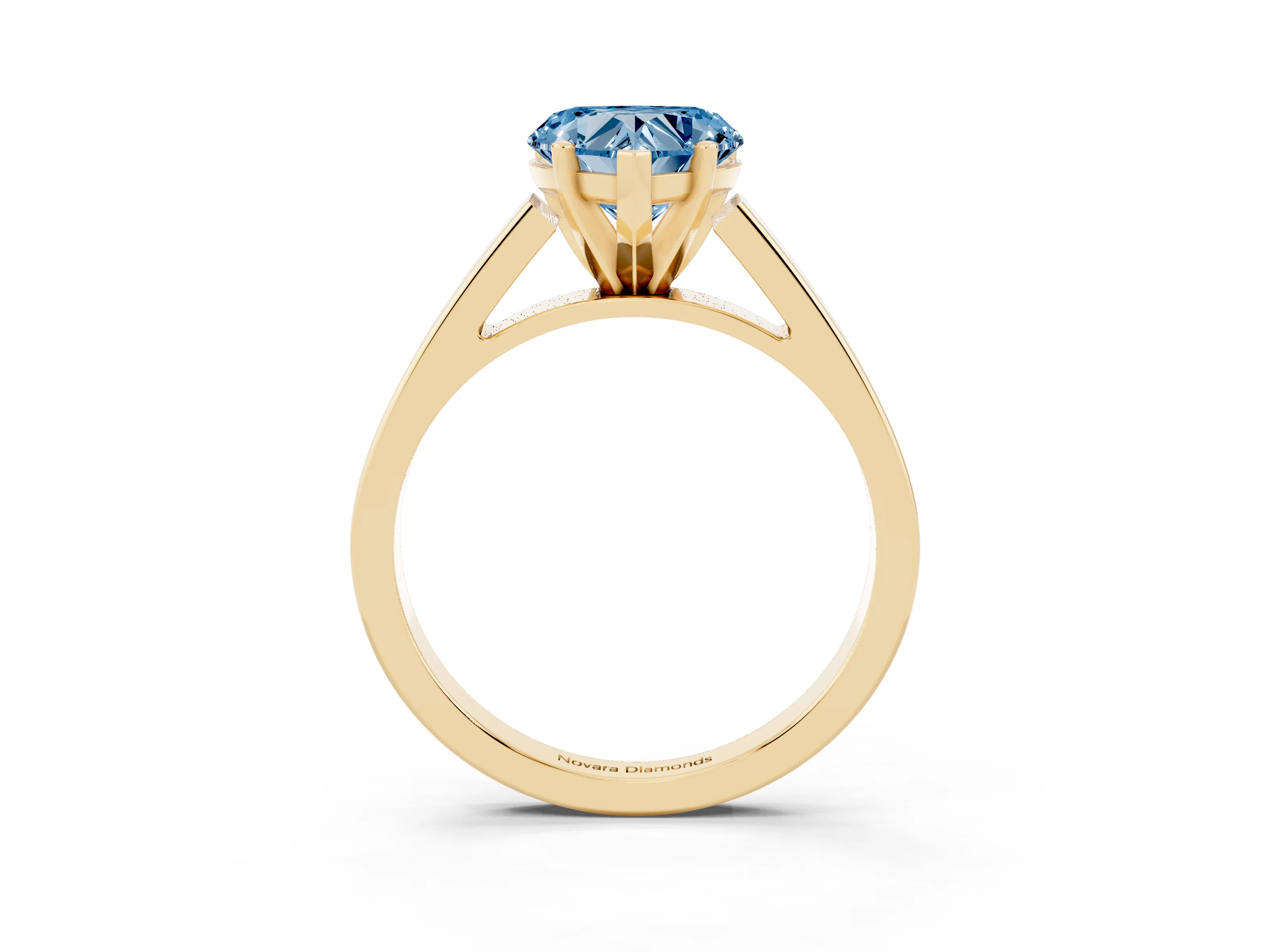 Fancy Blue Heart Cut Diamond Solitaire Engagement Ring Set in Yellow gold with Prong Setting and Tapered Band