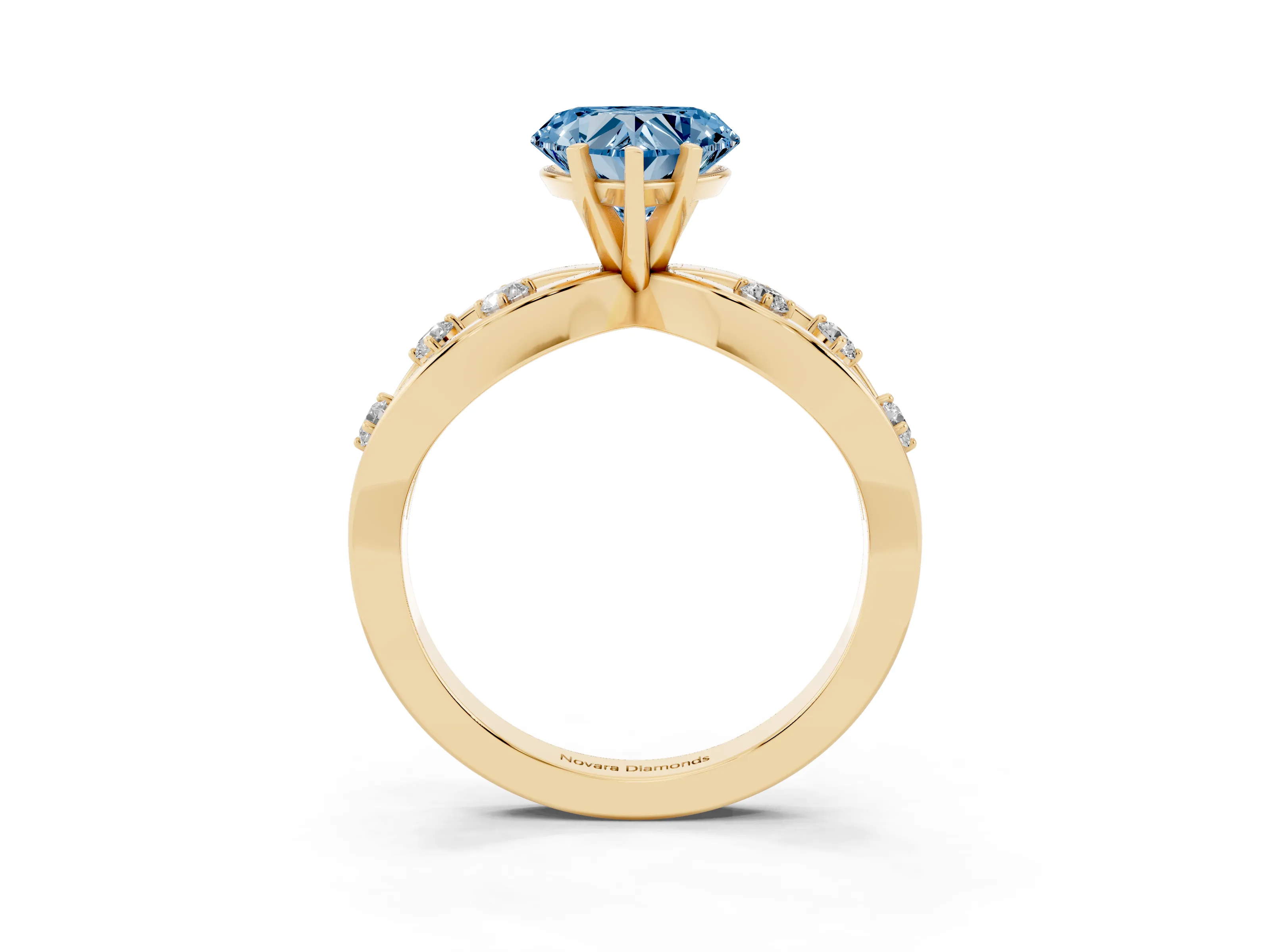 Fancy Blue Heart Cut Diamond Solitaire Ring Set in Yellow gold with Side Stones on Criss-Cross Band and Prong Setting