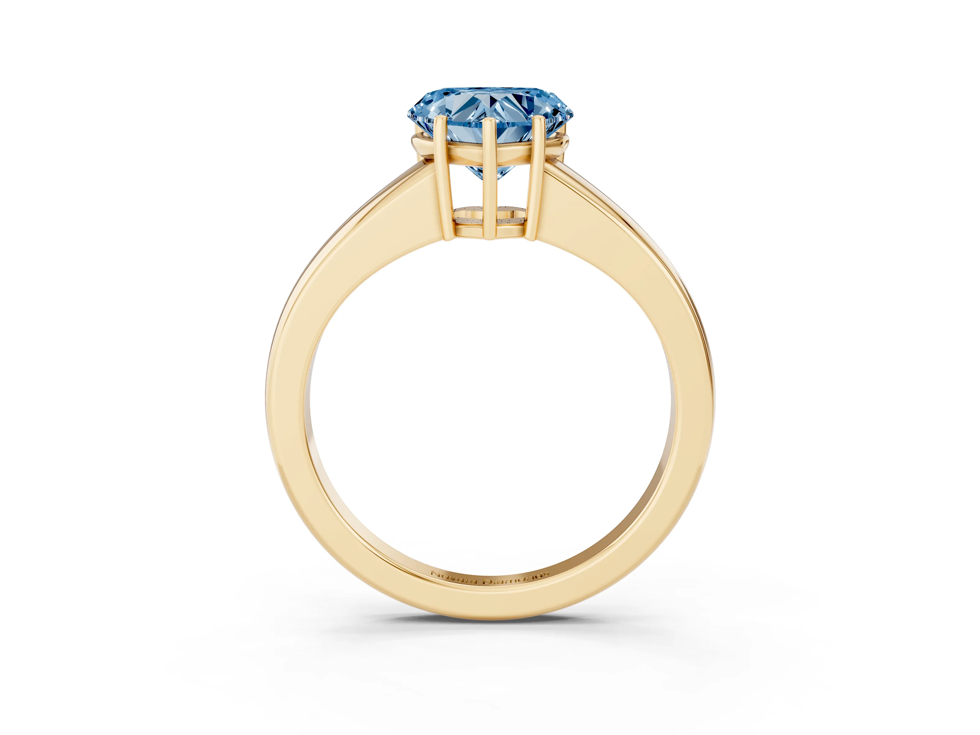 Fancy Blue Heart Cut Diamond Solitaire Ring Set in Yellow gold with Tapered Band and Prong Setting