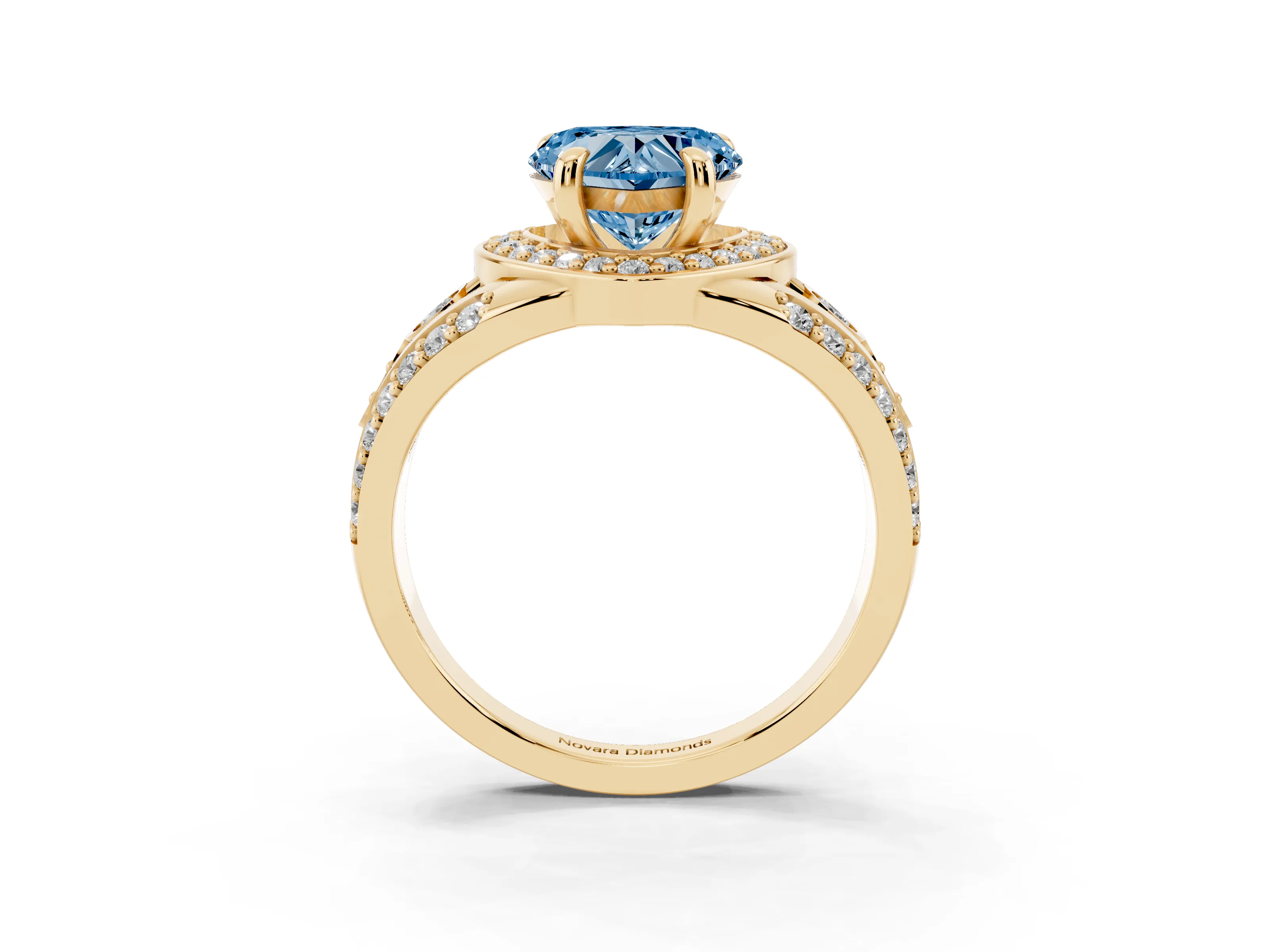 Fancy Blue Heart Cut Diamond Halo Ring Set in Yellow gold with Pavé Split Shank and Bezel Accents