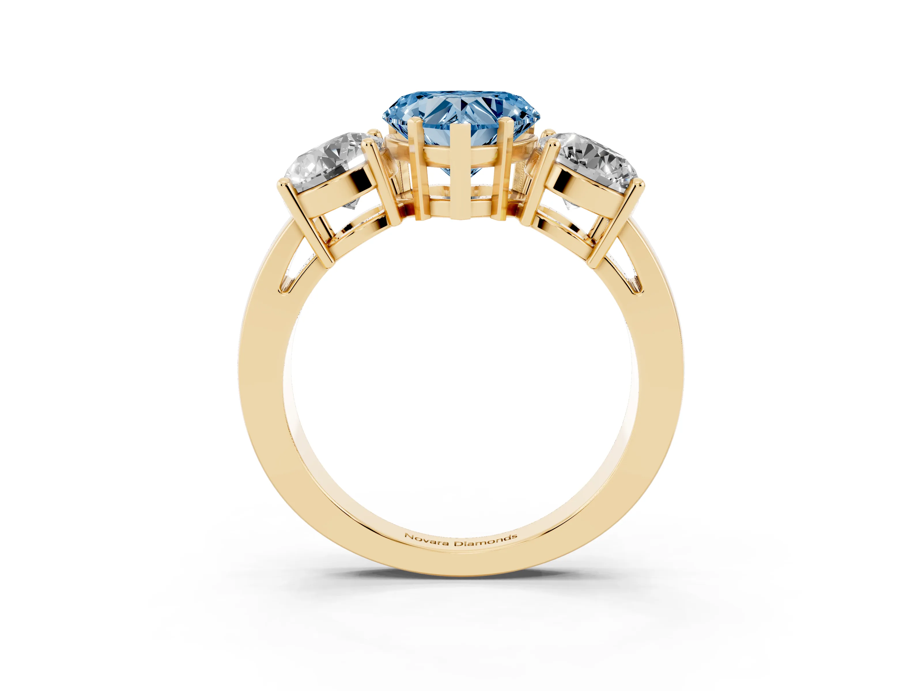 Fancy Blue Heart Cut Diamond Three-Stone Ring Set in Yellow gold with Round Side Stones and Classic Band