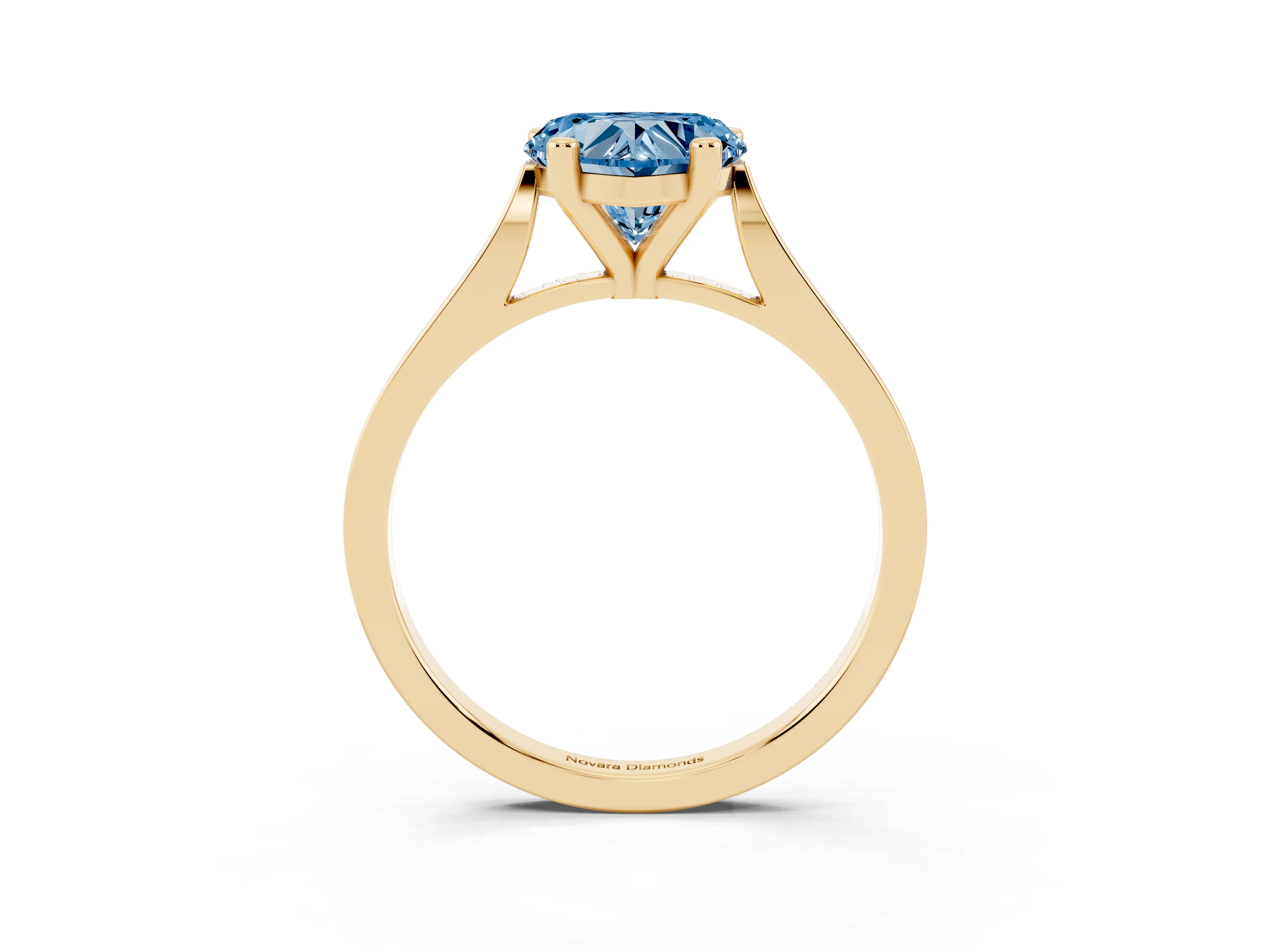 Fancy Blue Heart Cut Diamond Solitaire Ring Set in Yellow gold with Prong Setting and Tapered Band