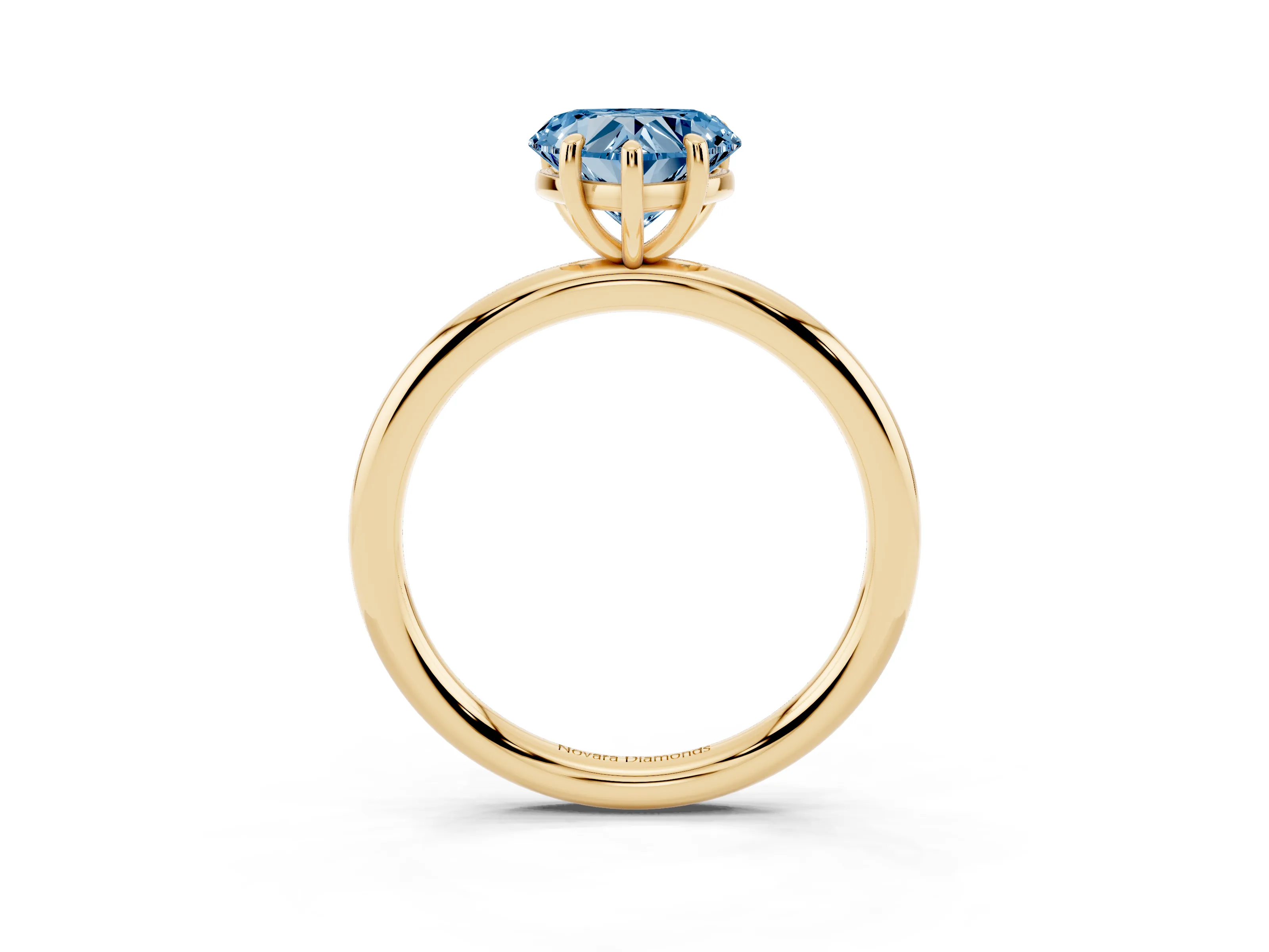 Fancy Blue Heart Cut Diamond Solitaire Ring Set in Yellow gold with Prong Setting on a Polished Plain Band