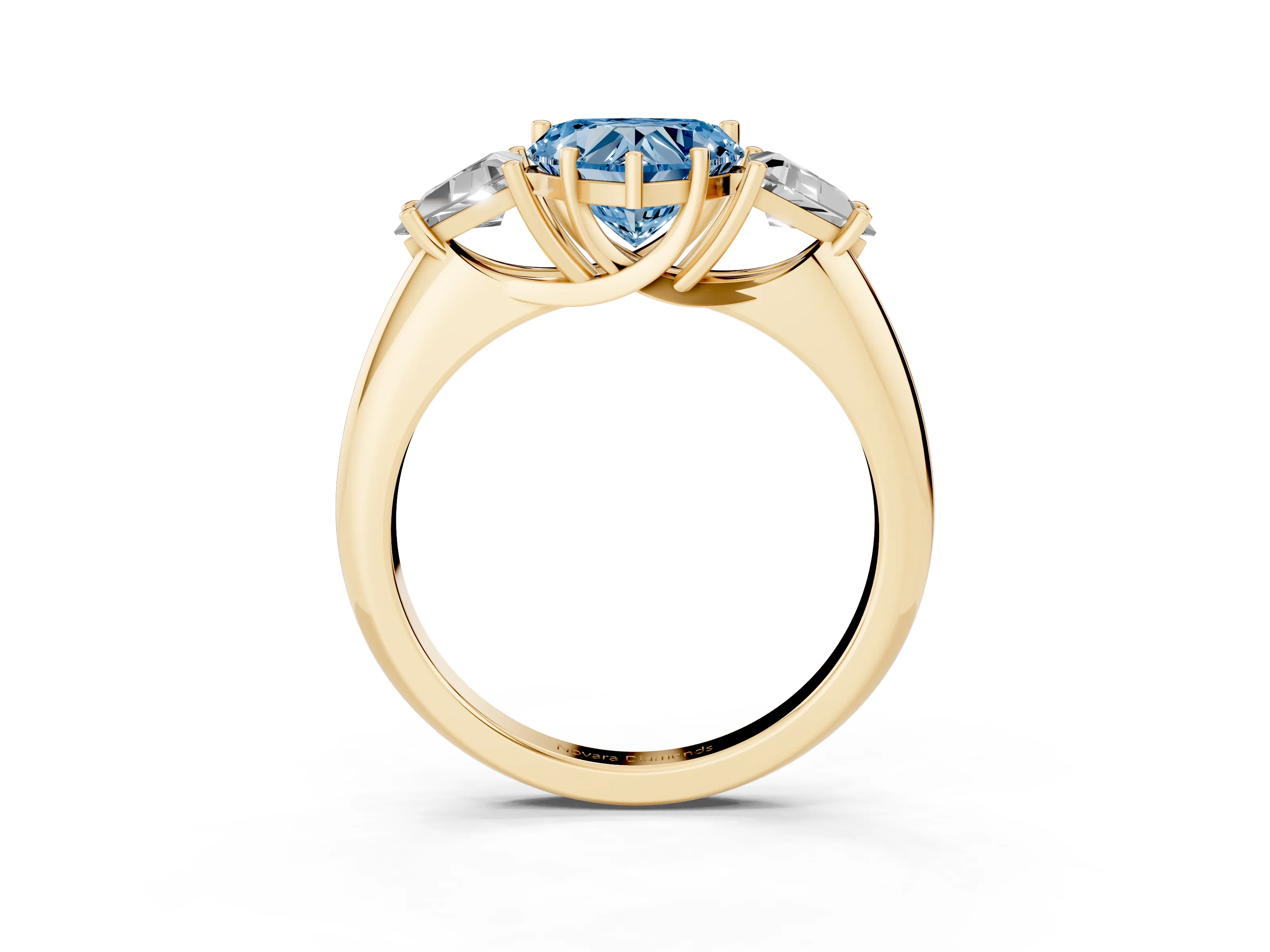 Fancy Blue Heart Cut Diamond Three-Stone Engagement Ring Set in Yellow gold with Trillion Side Stones