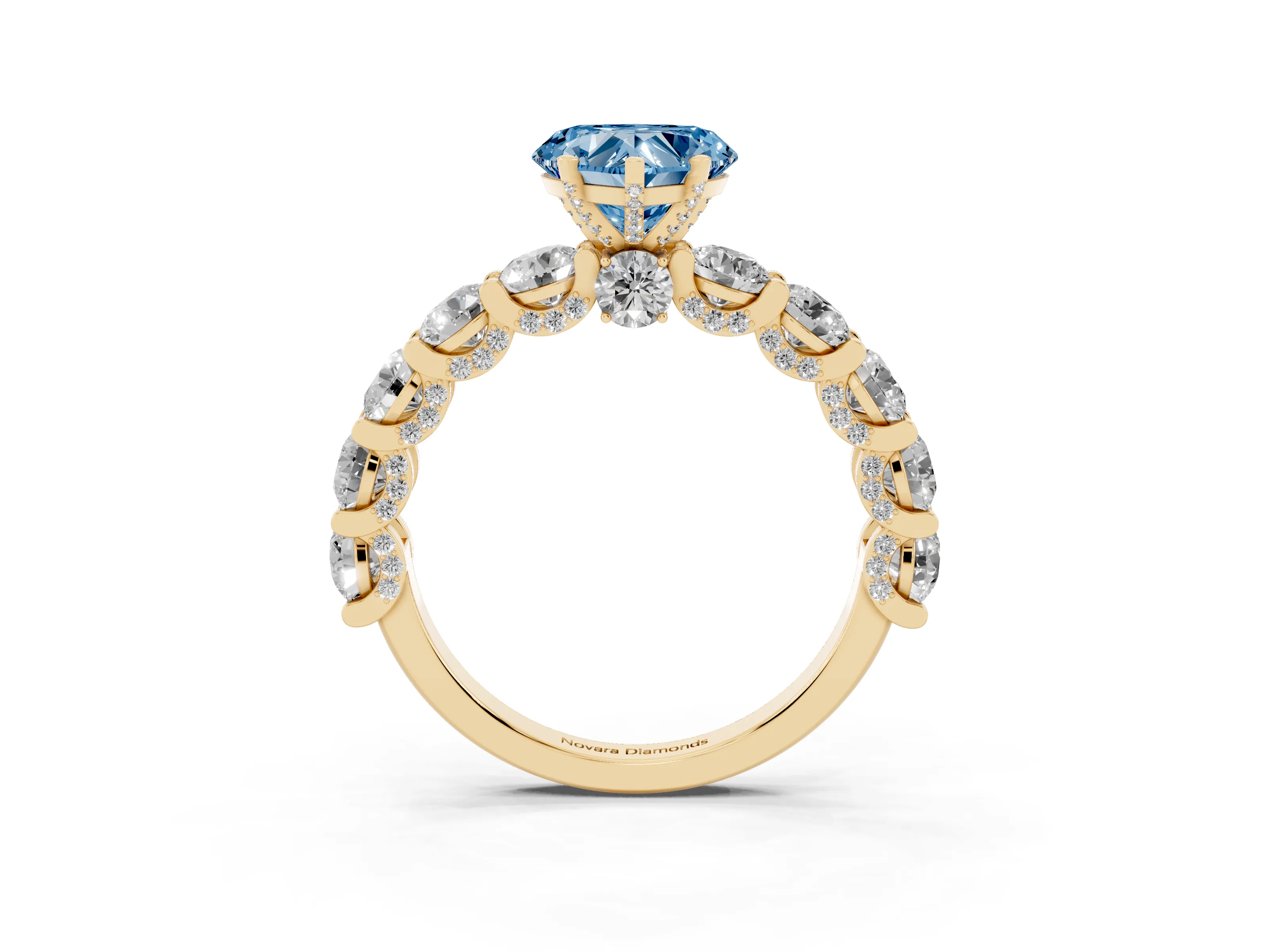 Fancy Blue Heart Cut Diamond Side Stone Ring Set in Yellow gold with Alternating Round and Oval Side Stones