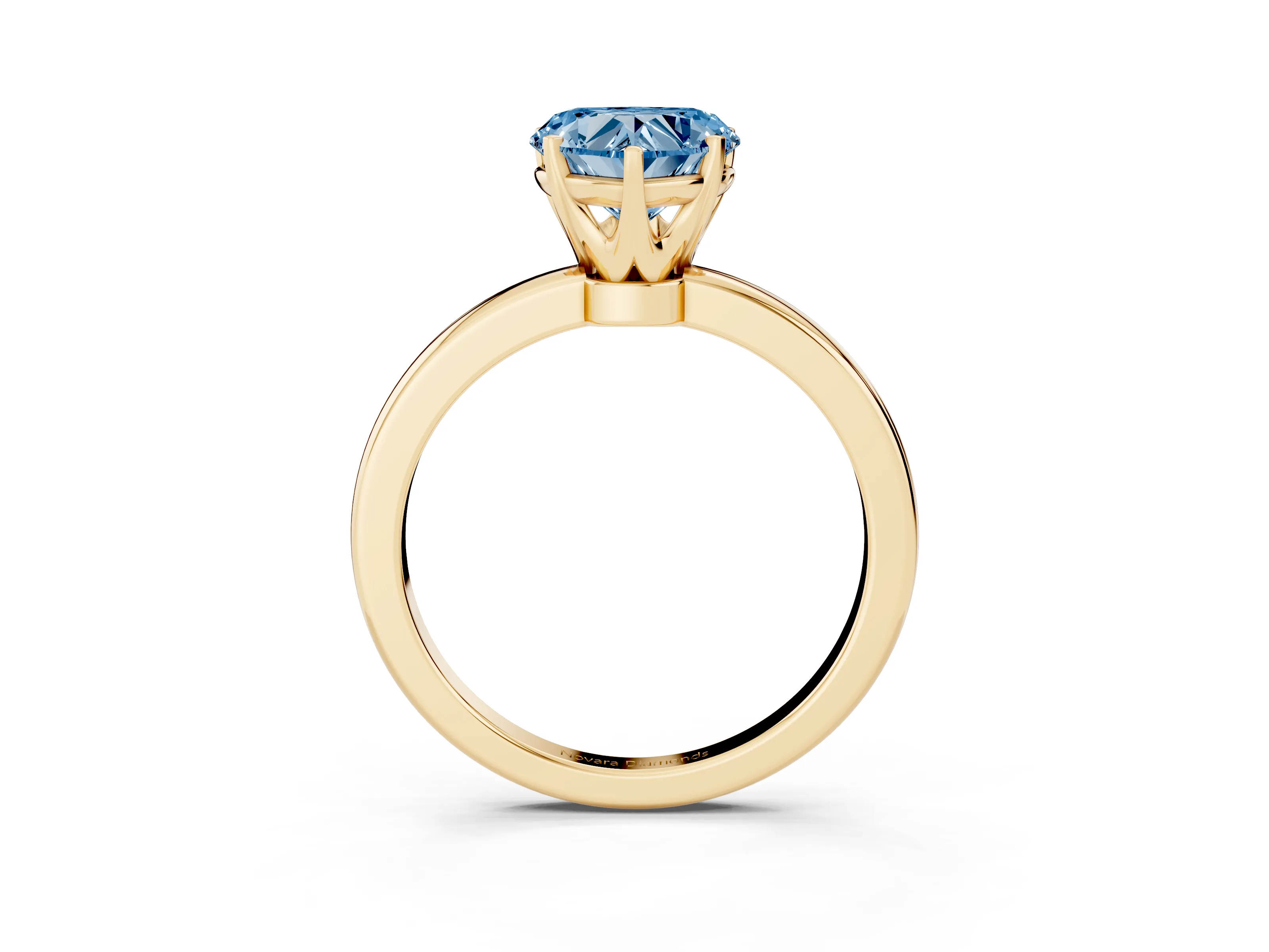 Fancy Blue Heart Cut Diamond Solitaire Ring Set in Yellow gold with Raised Prong Setting on a Classic Band
