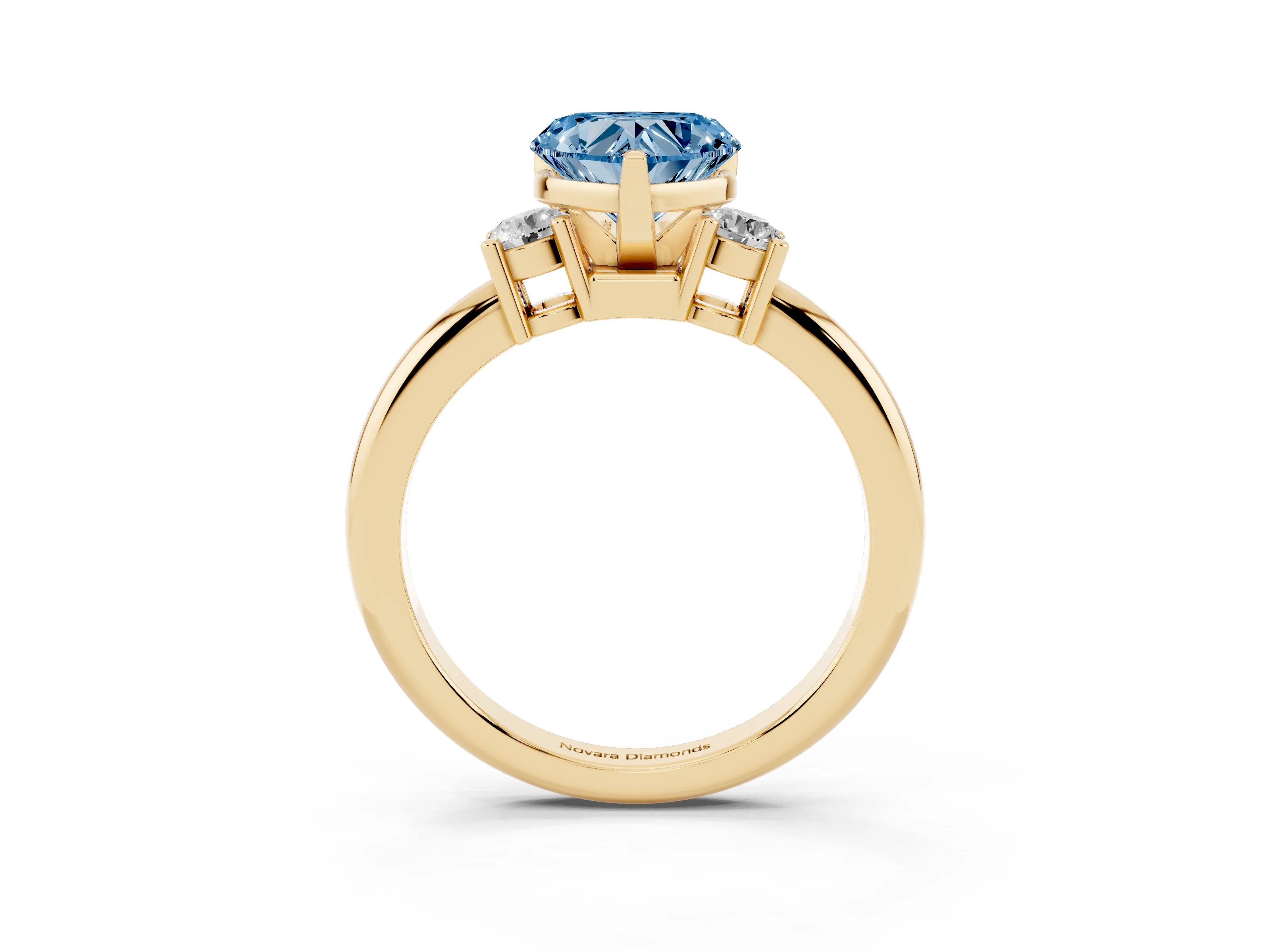 Fancy Blue Three-Stone Heart Cut Diamond Ring Set in Yellow gold with Prong Setting and Plain Band
