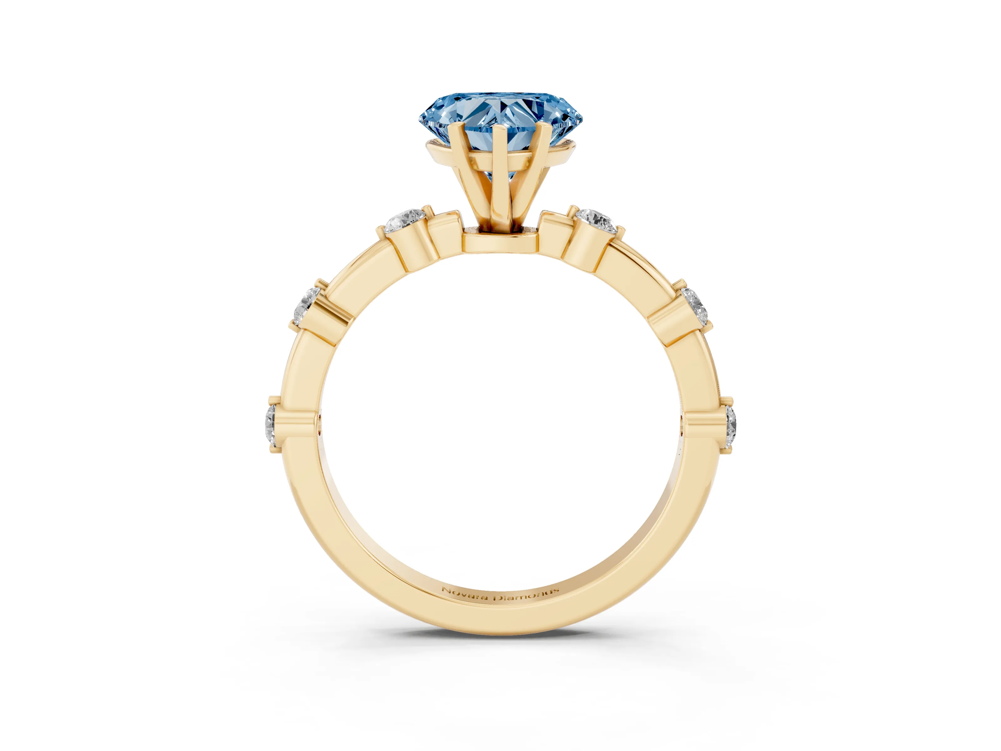 Fancy Blue Heart Cut Diamond Solitaire Ring Set in Yellow gold with Bezel Set Side Stones and Prong Setting