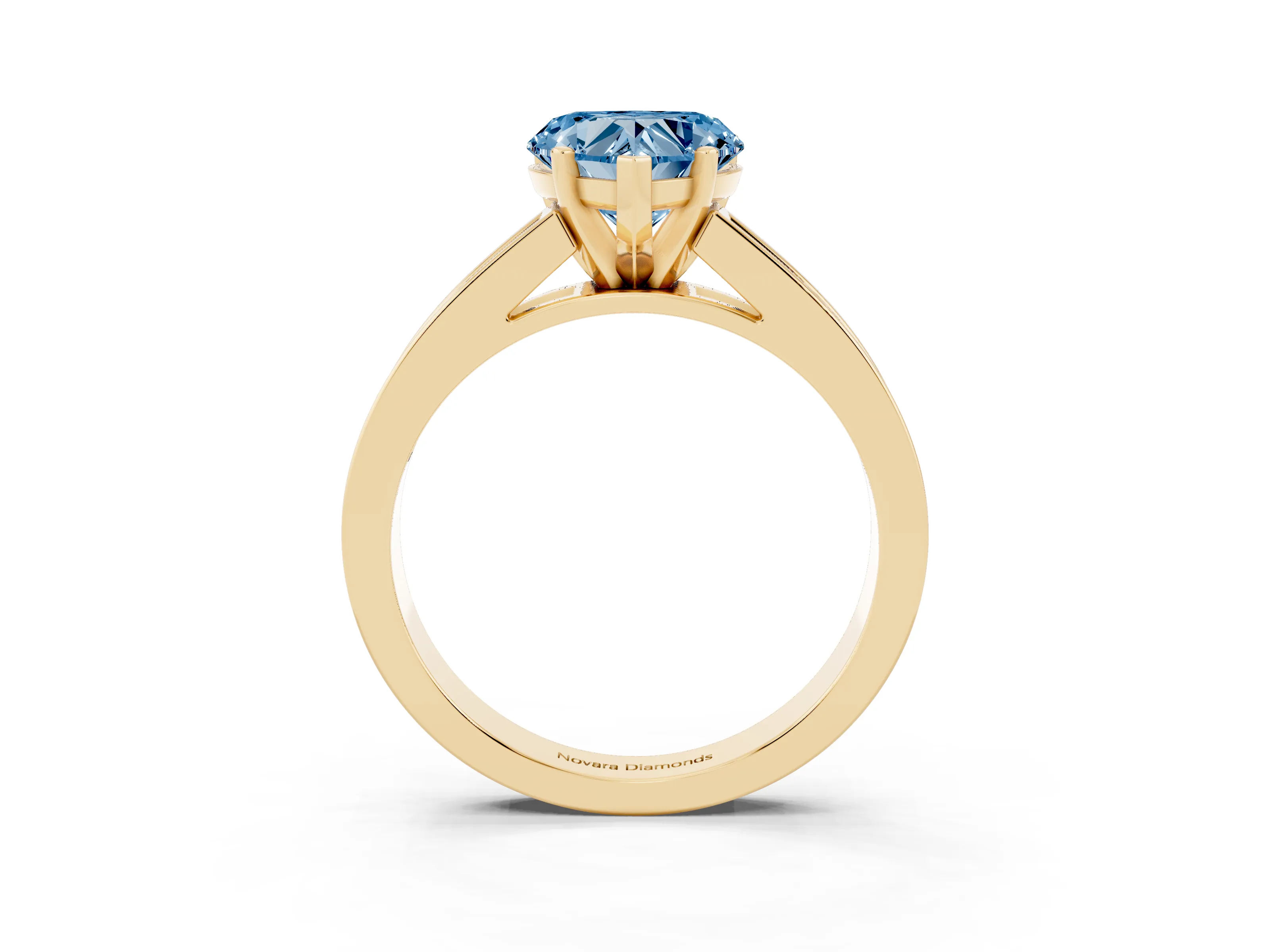 Fancy Blue Heart Cut Diamond Solitaire Ring Set in Yellow gold with Channel-Set Band and Prong Setting