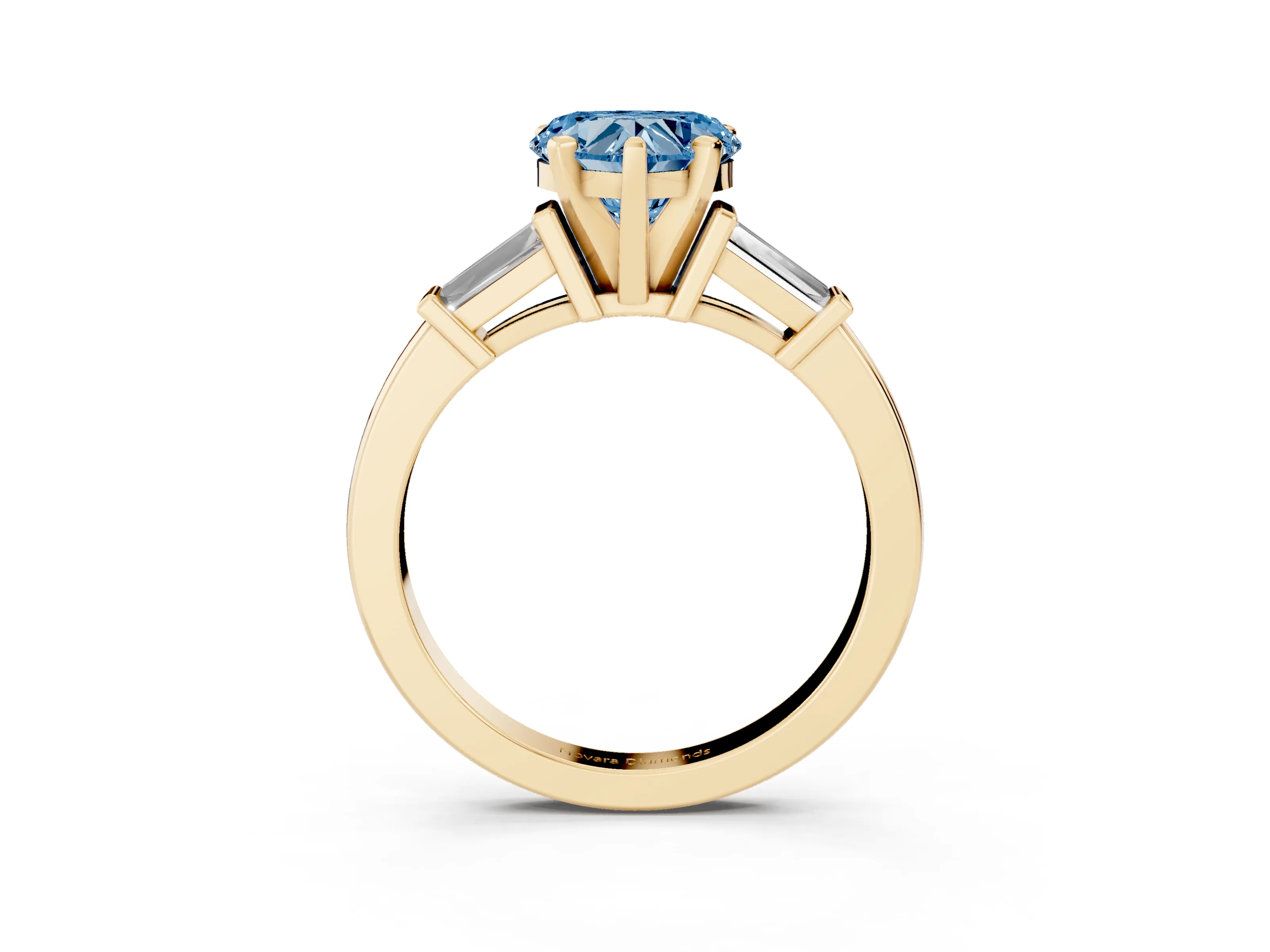 Fancy Blue Heart Cut Diamond Solitaire Ring Set in Yellow gold with Tapered Baguette Accents and Prong Setting