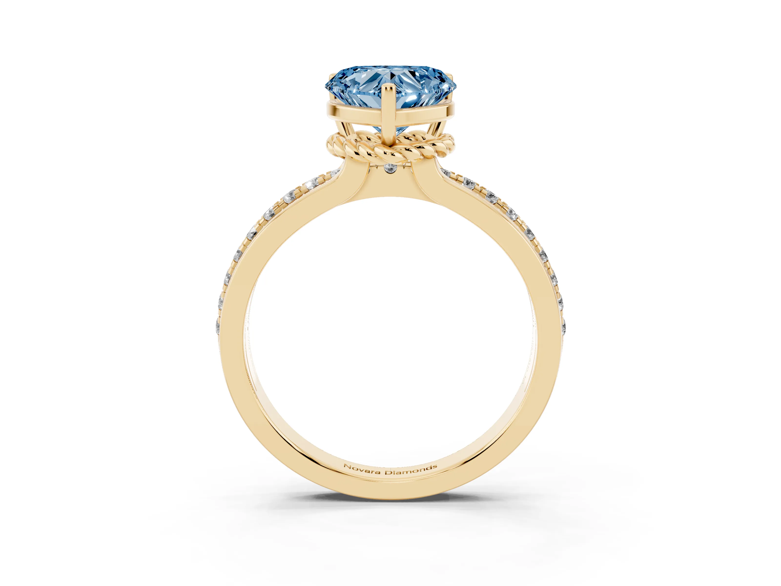 Fancy Blue Heart Cut Diamond Solitaire Ring Set in Yellow gold with Channel Set Band and Prong Setting
