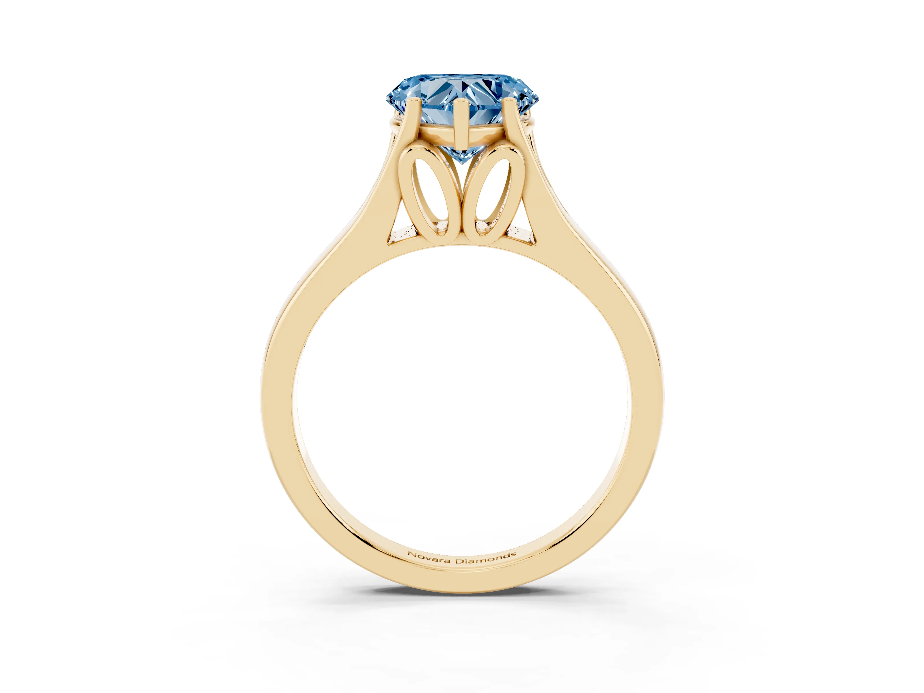 Fancy Blue Heart Cut Diamond Solitaire Ring Set in Yellow gold with Arched Cathedral Band and Prong Setting