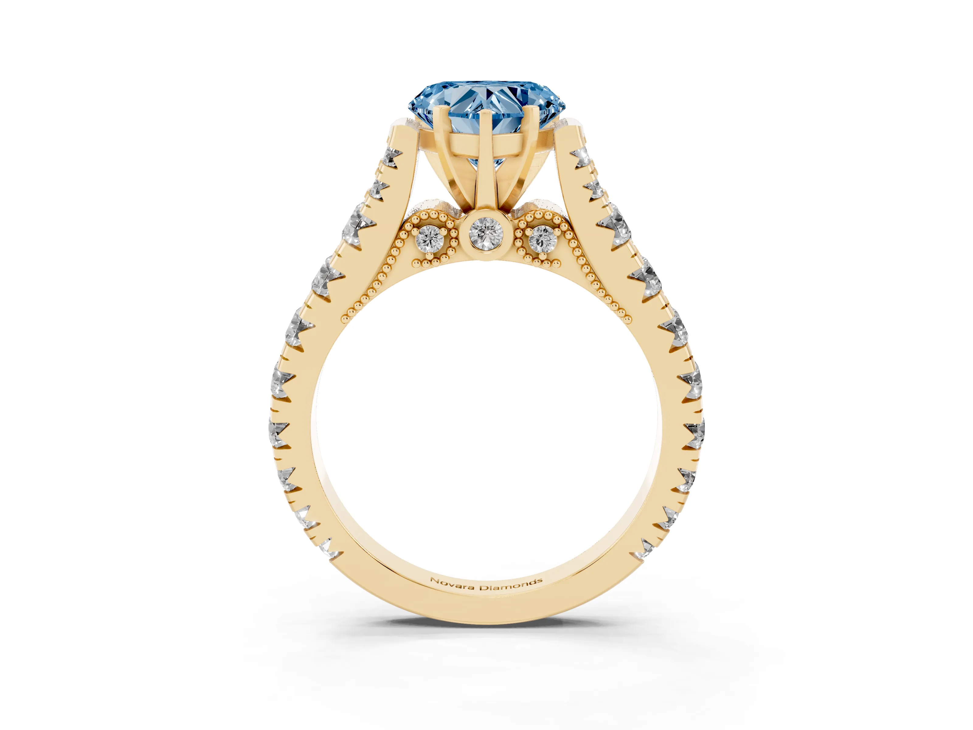 Fancy Blue Heart Cut Diamond Classic Solitaire Ring Set in Yellow gold with Pavé Band and Prong Setting