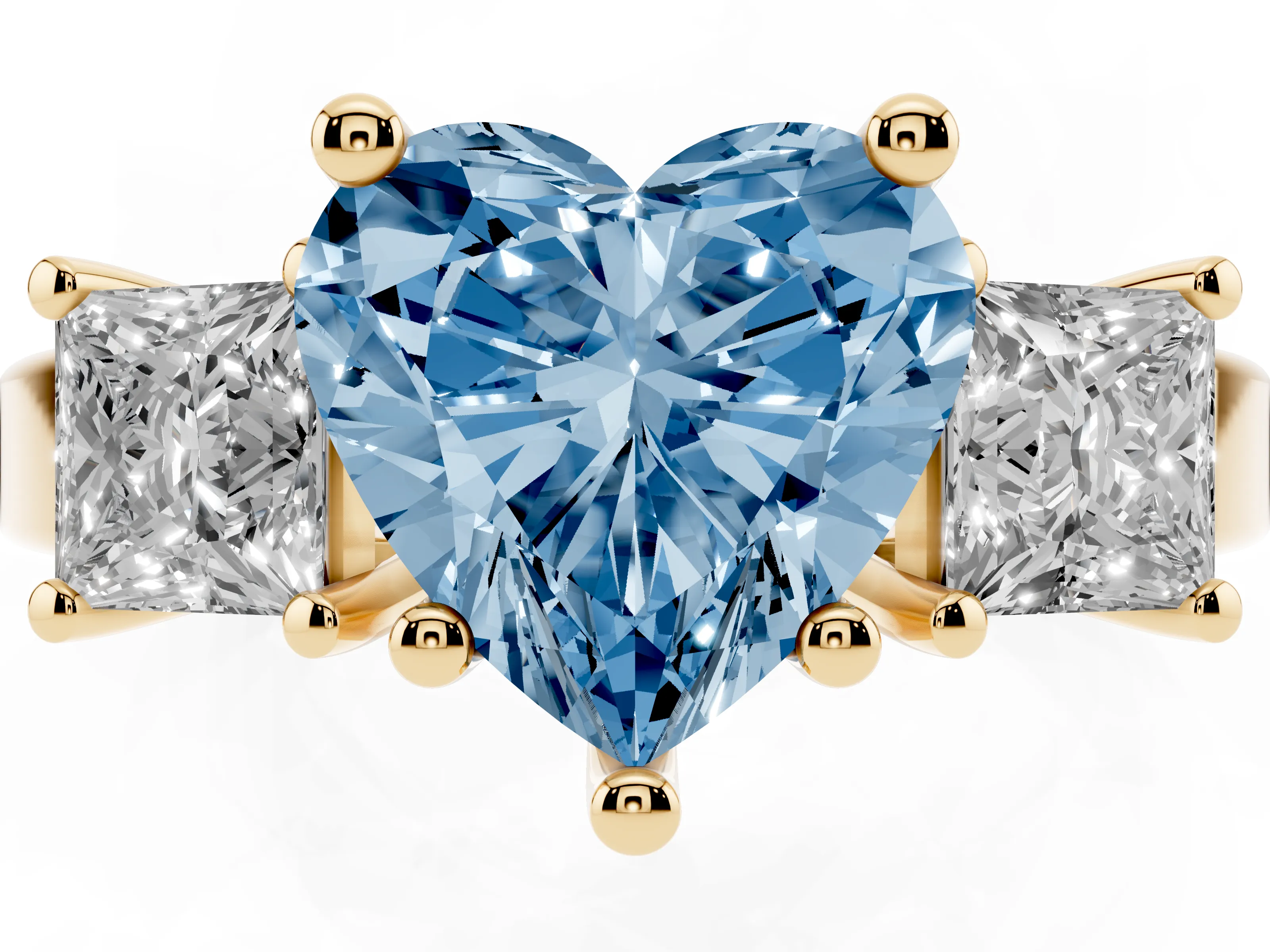 Fancy Blue Three-Stone Heart Cut Diamond Solitaire Ring Set in Yellow gold with Prong Setting