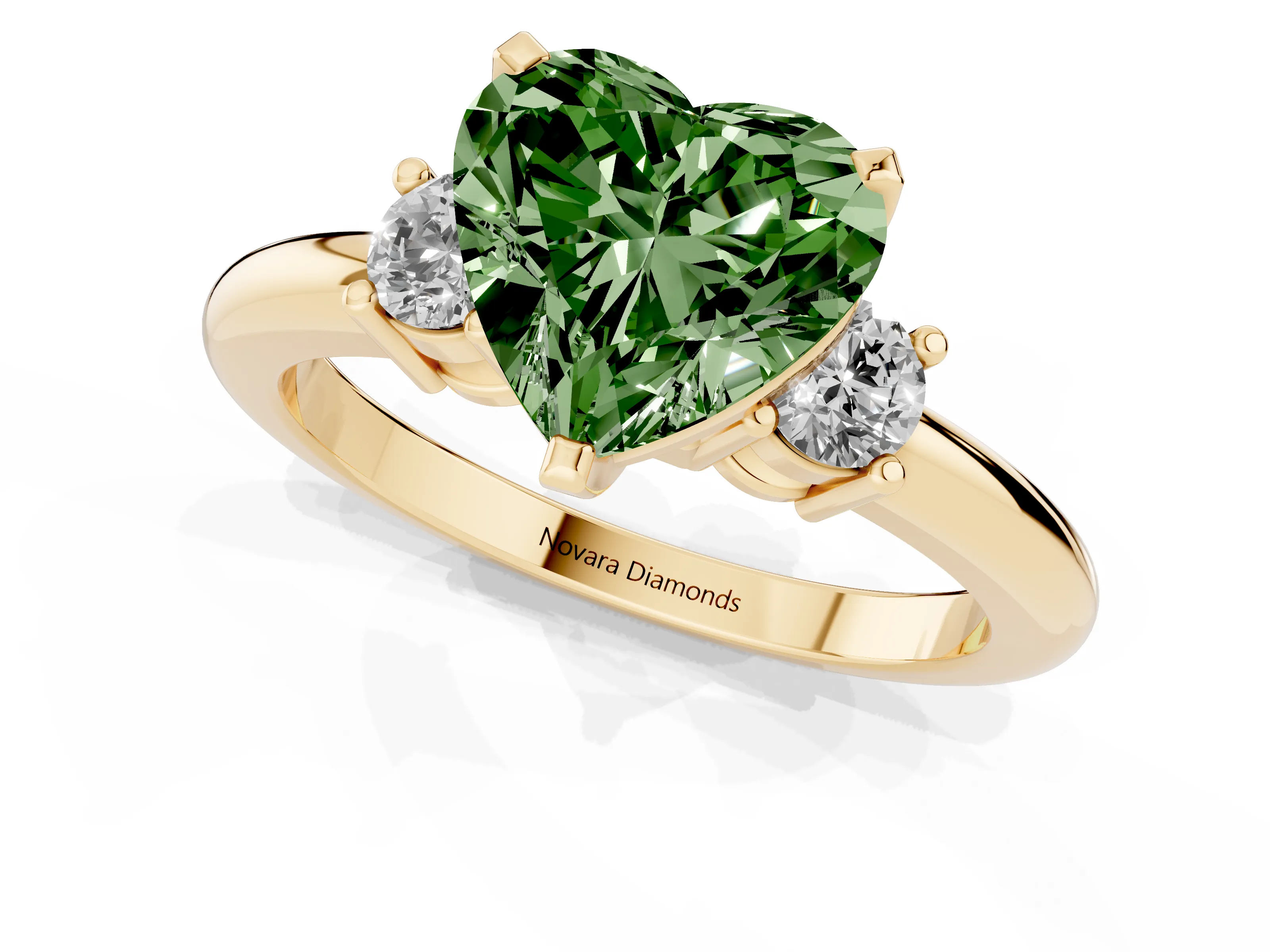 Fancy Green Three-Stone Heart Cut Diamond Ring Set in Yellow gold with Prong Setting and Plain Band