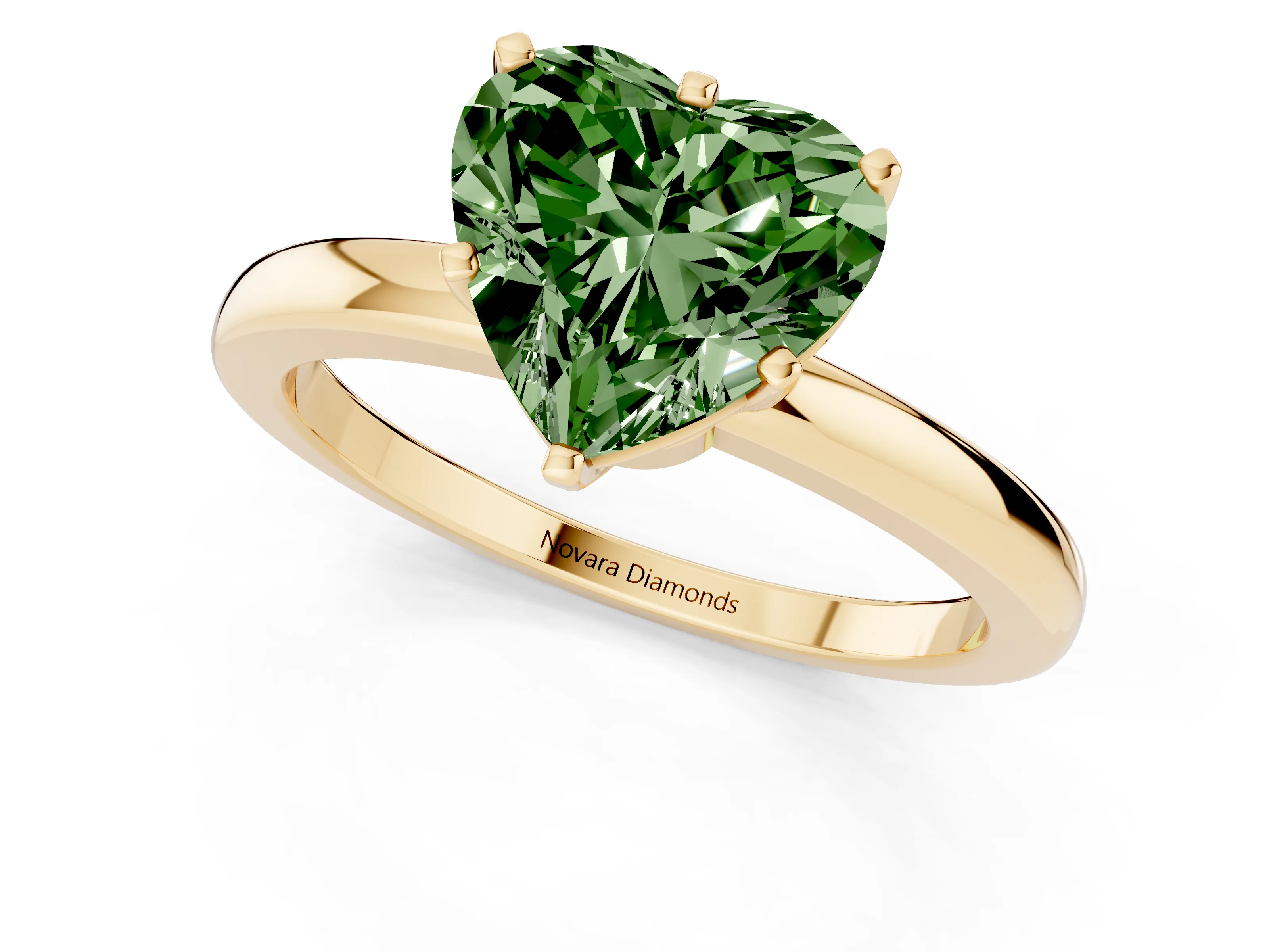 Fancy Green Heart Cut Diamond Solitaire Ring Set in Yellow gold with Raised Prong Setting on a Classic Band