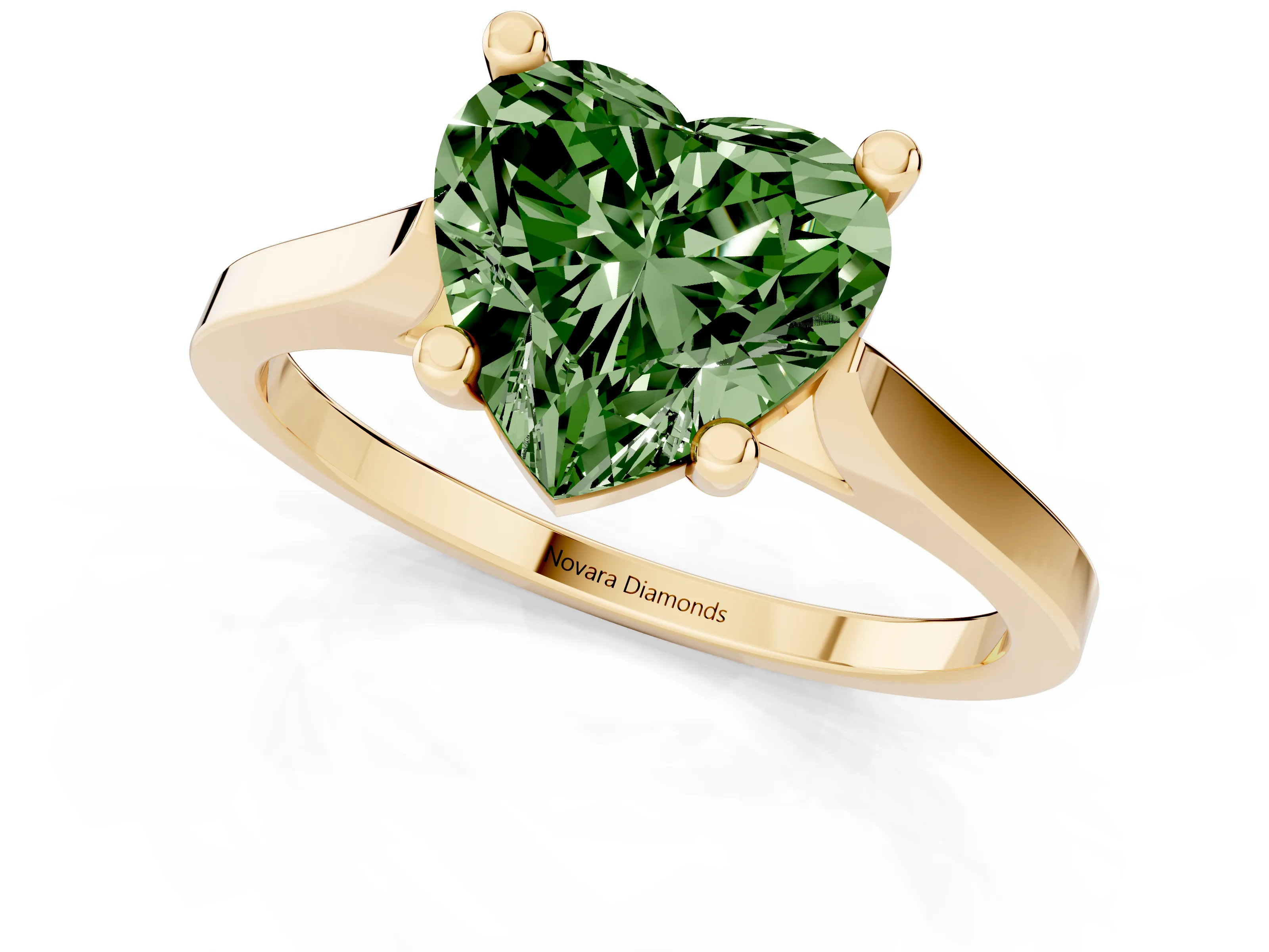 Fancy Green Heart Cut Diamond Solitaire Ring Set in Yellow gold with Prong Setting and Tapered Band