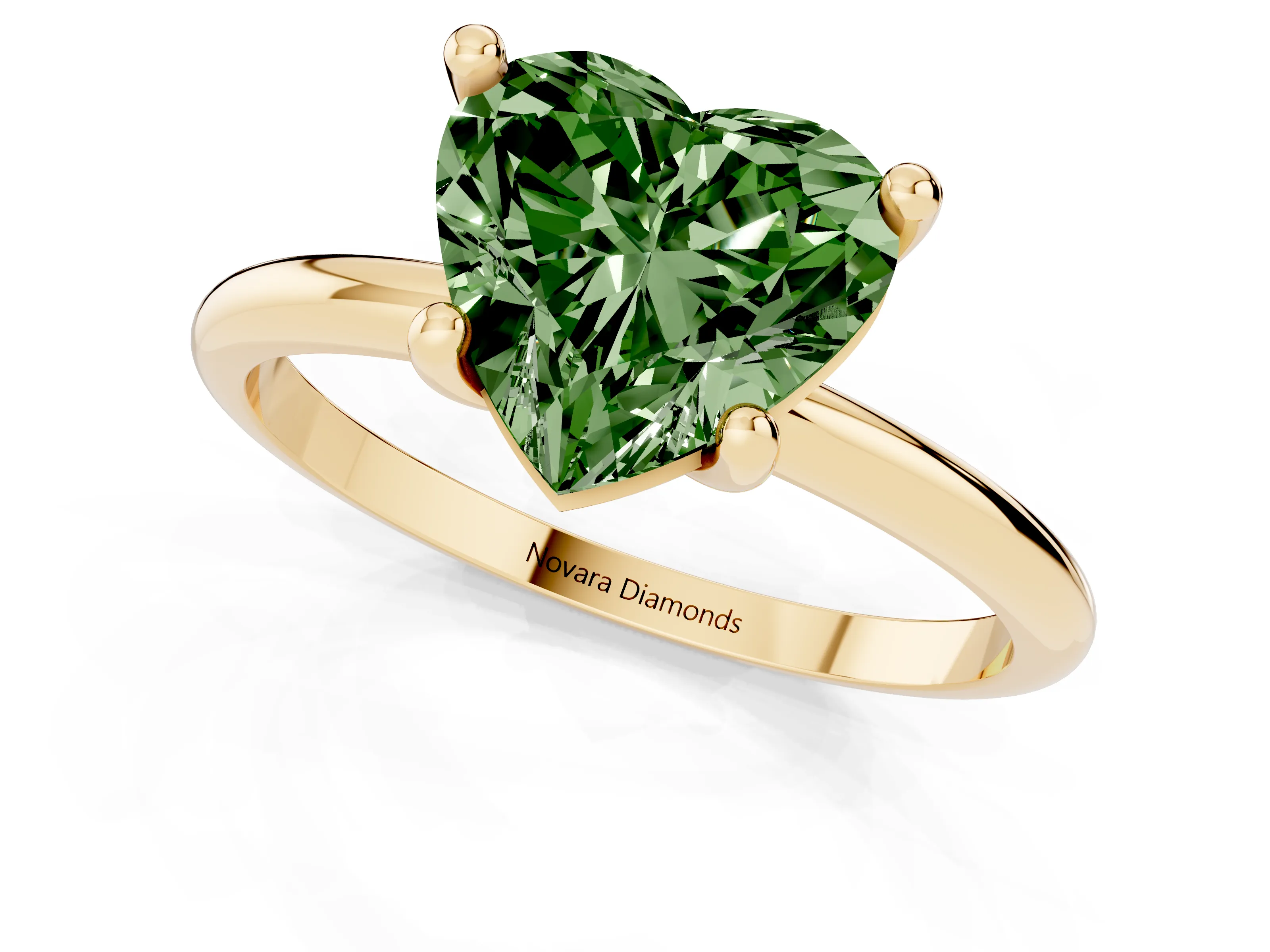 Fancy Green Heart Cut Diamond Solitaire Ring Set in Yellow gold with Secure Prong Setting on a Classic Band