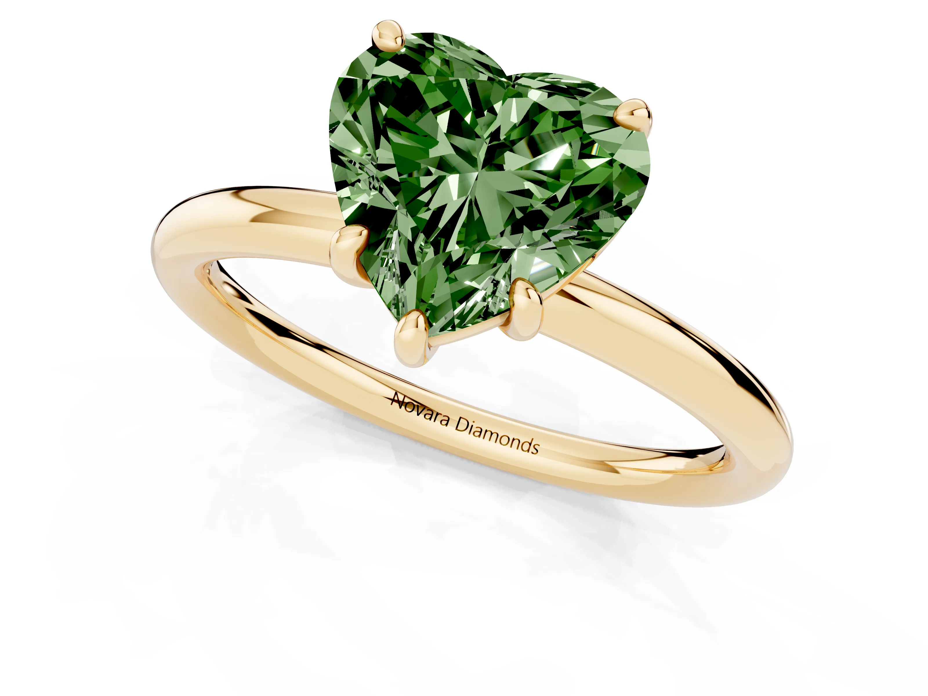 Fancy Green Heart Cut Diamond Solitaire Ring Set in Yellow gold with Prong Setting on a Polished Plain Band