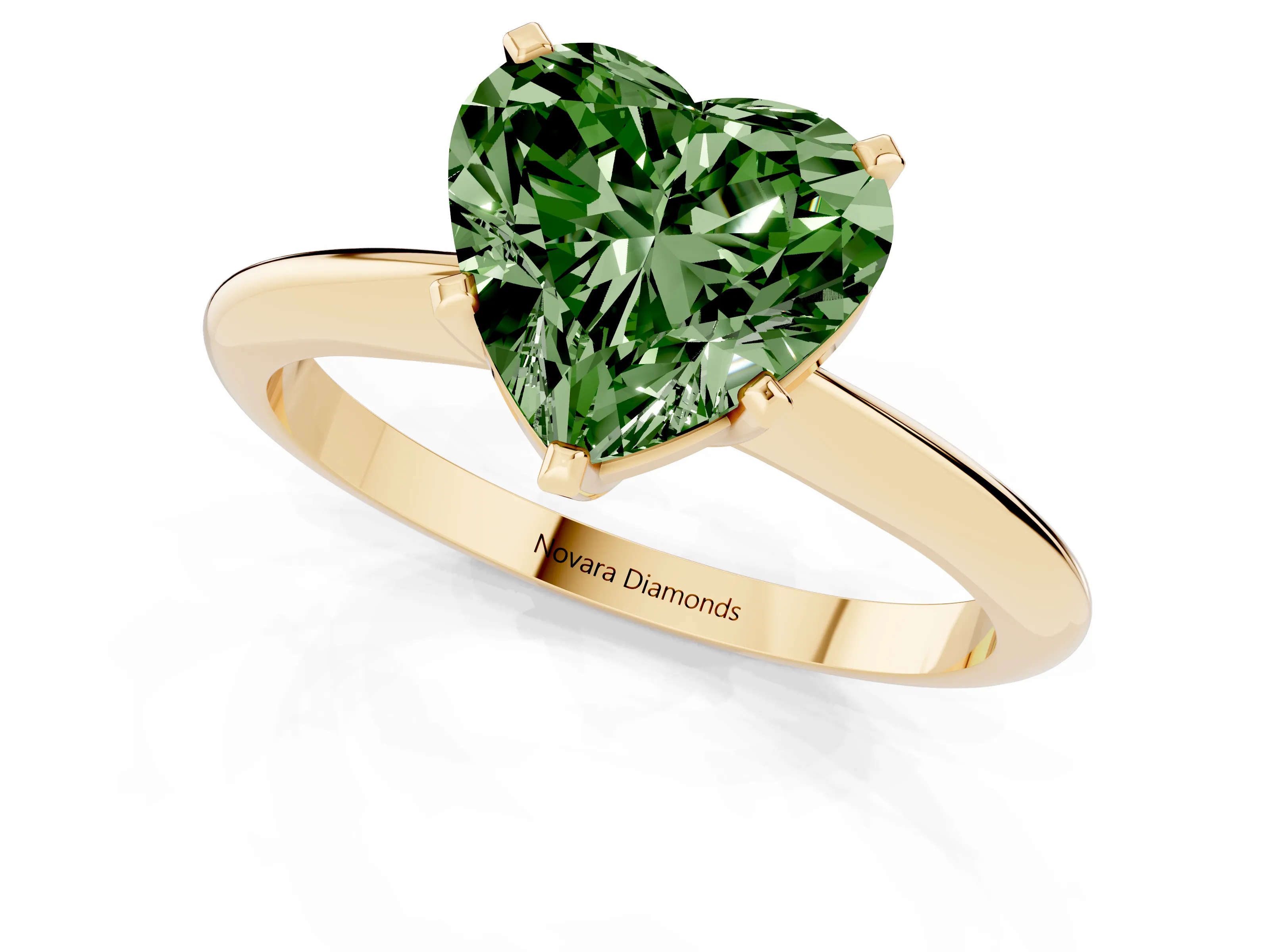 Fancy Green Heart Cut Diamond Solitaire Ring Set in Yellow gold with Prong Setting on a Plain Round Band