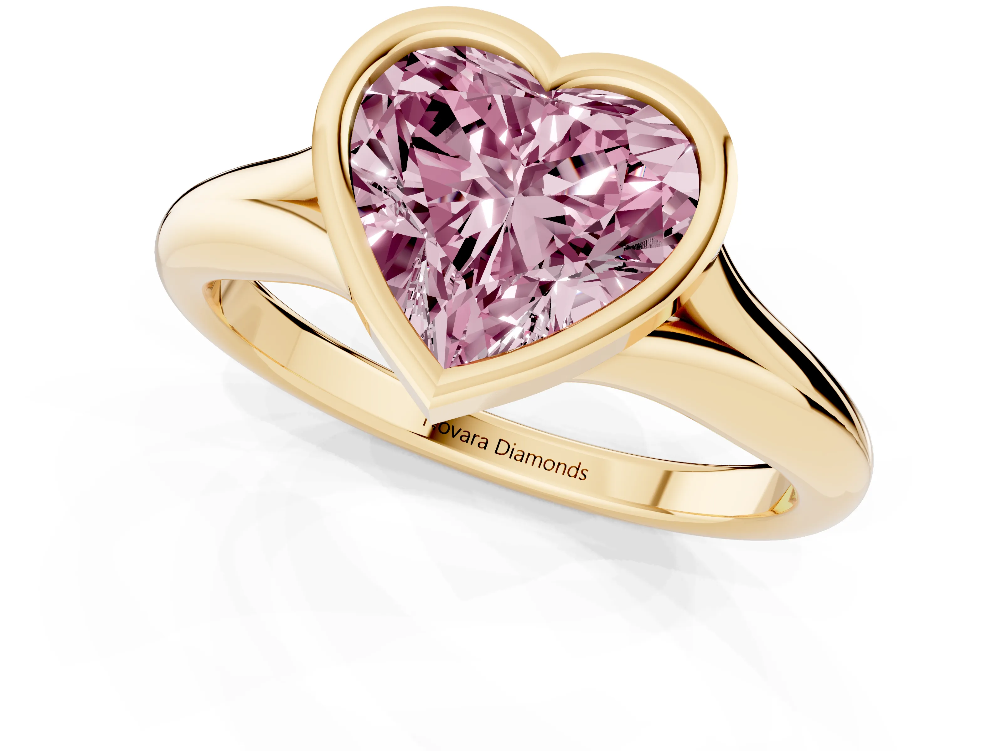 Fancy Pink Bezel Set Heart Cut Diamond Solitaire Ring Set in Yellow gold with Smooth Band