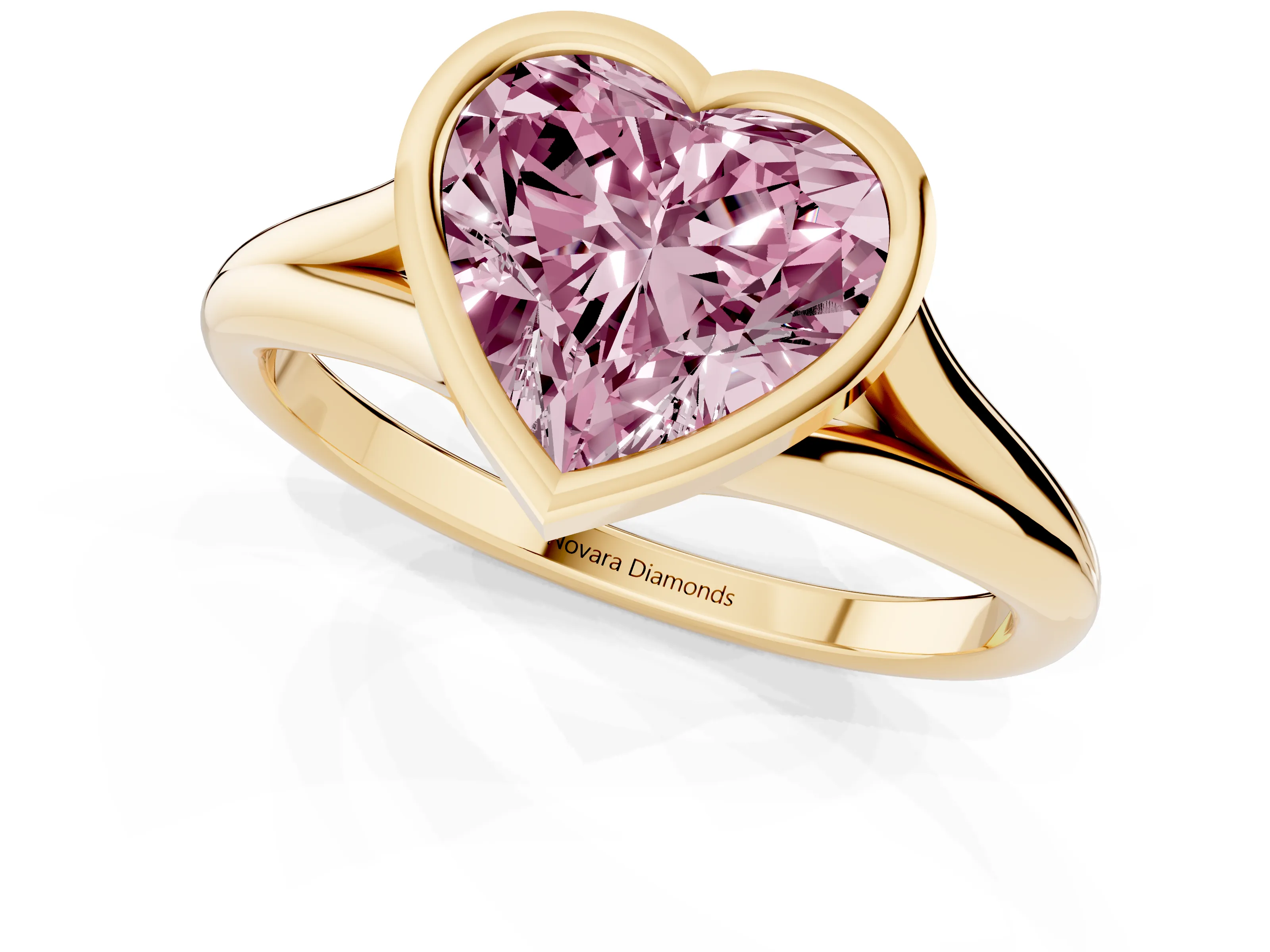 Fancy Pink Bezel Set Heart Cut Diamond Solitaire Ring Set in Yellow gold with Tapered Band
