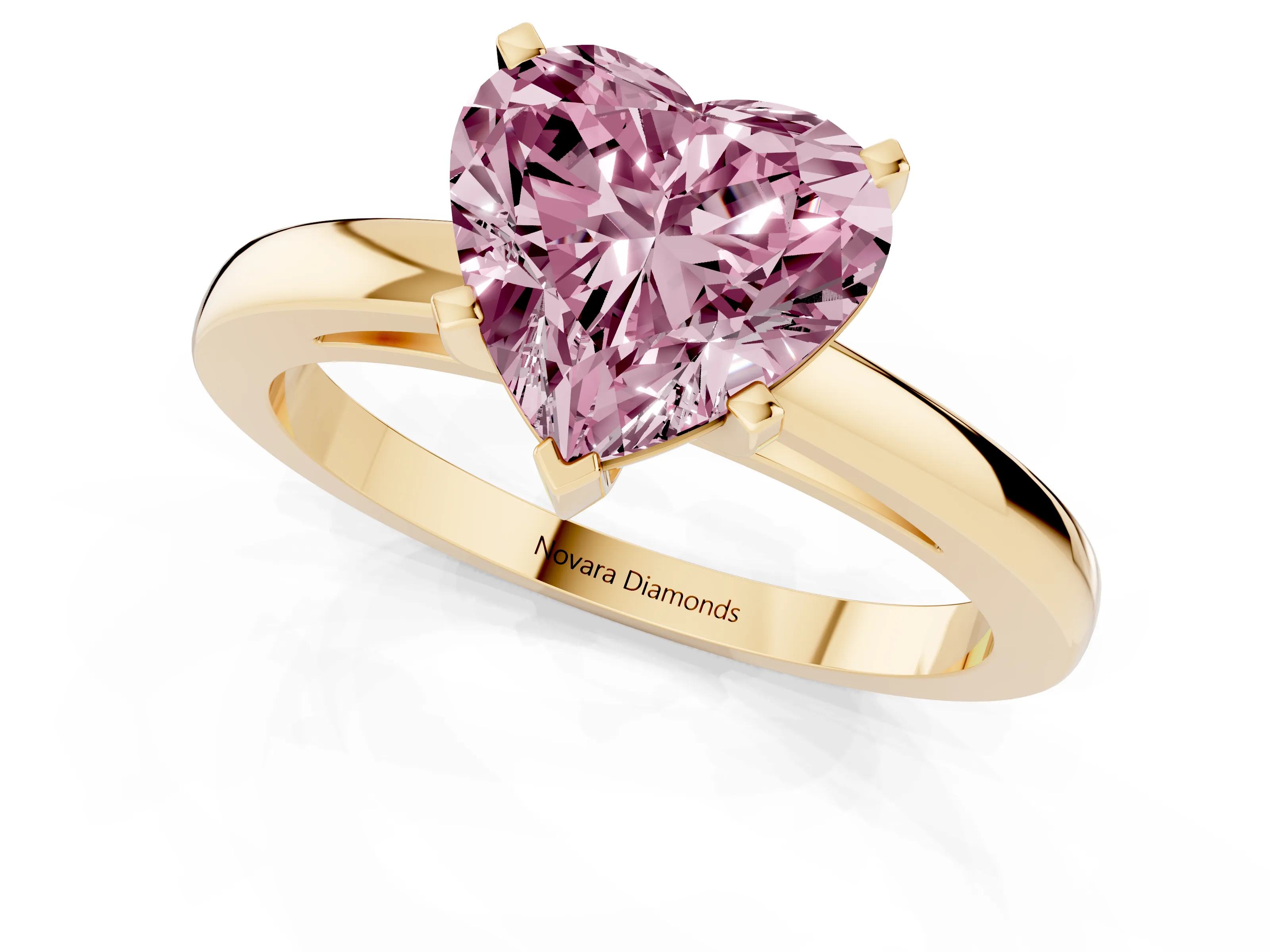 Fancy Pink Heart Cut Diamond Solitaire Engagement Ring Set in Yellow gold with Prong Setting on a Classic Band