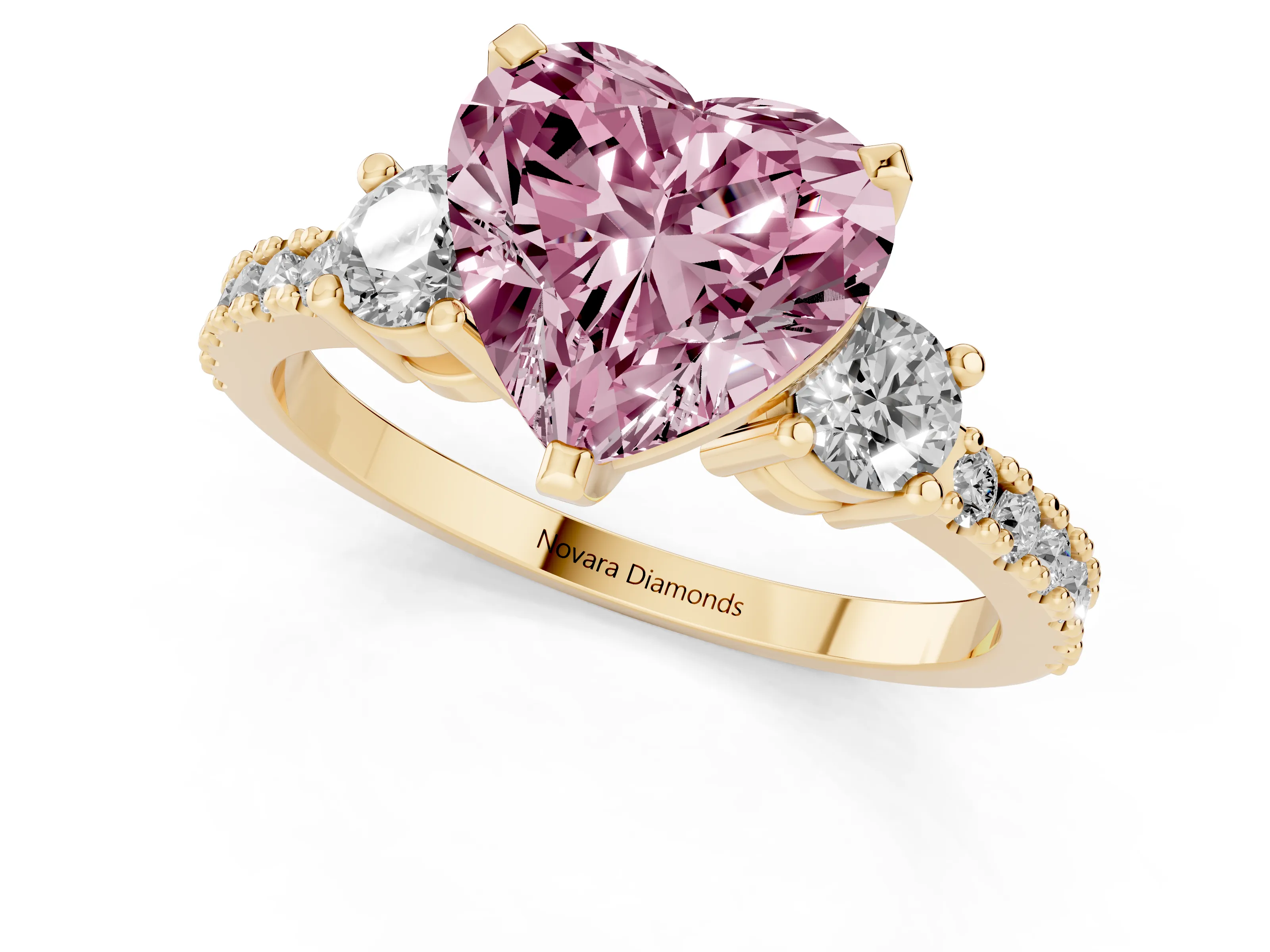 Fancy Pink Three-Stone Heart Cut Diamond Pavé Band Ring Set in Yellow gold with Prong Setting