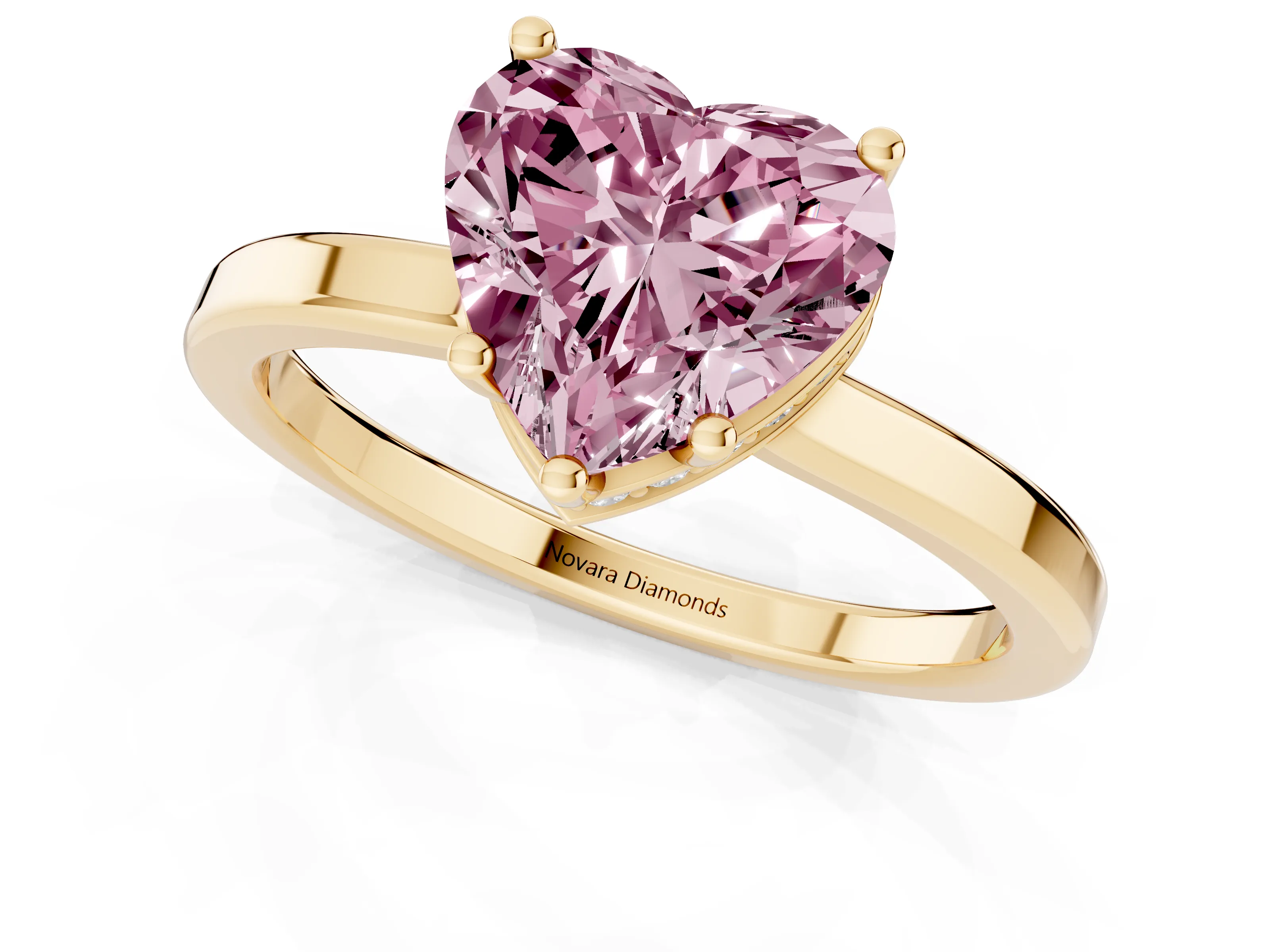 Fancy Pink Heart Cut Diamond Solitaire Engagement Ring Set in Yellow gold with Prong Setting on a Plain Band