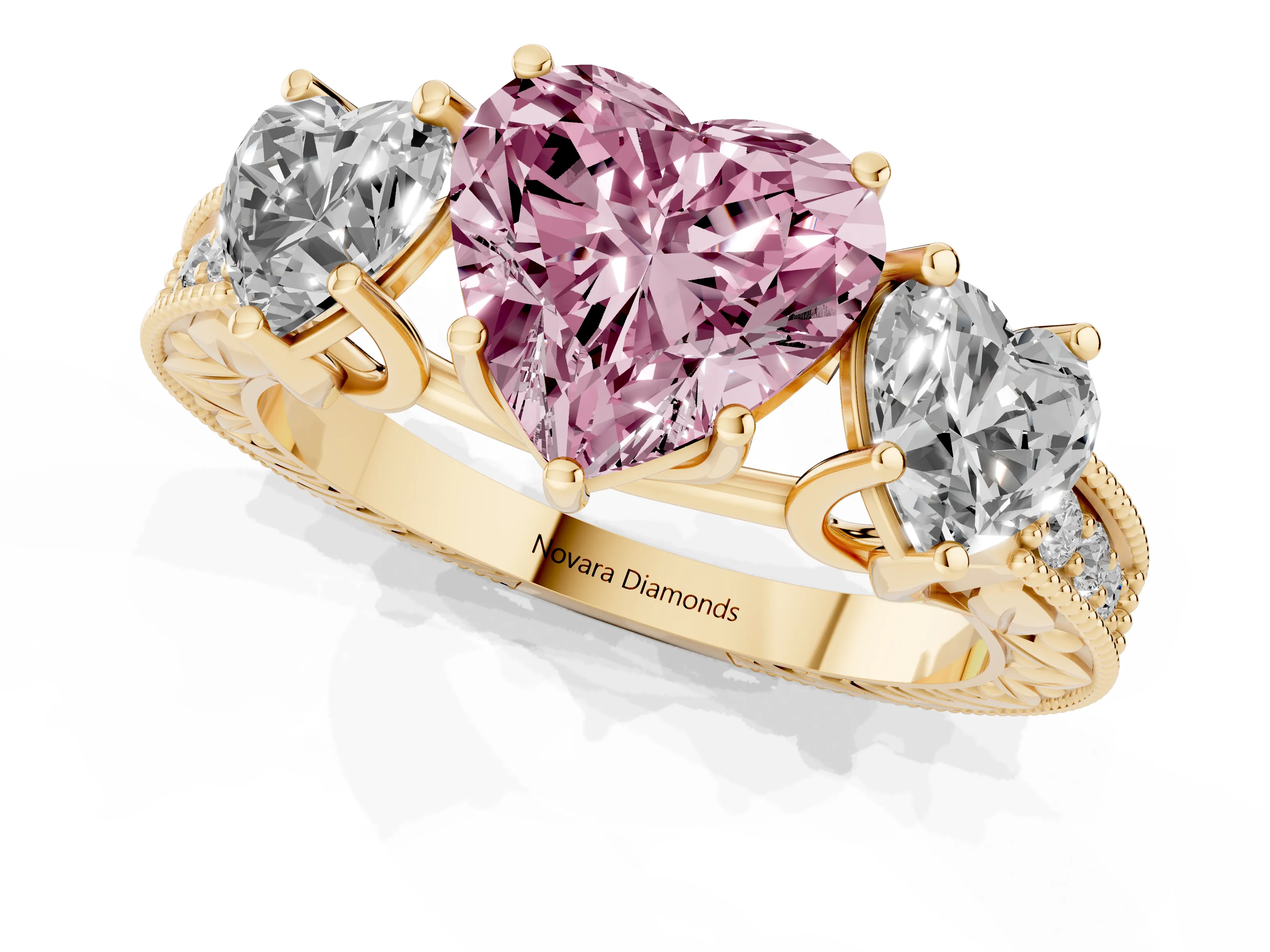 Fancy Pink Heart Cut Diamond Three-Stone Engagement Ring Set in Yellow gold with Milgrain Pavé Band