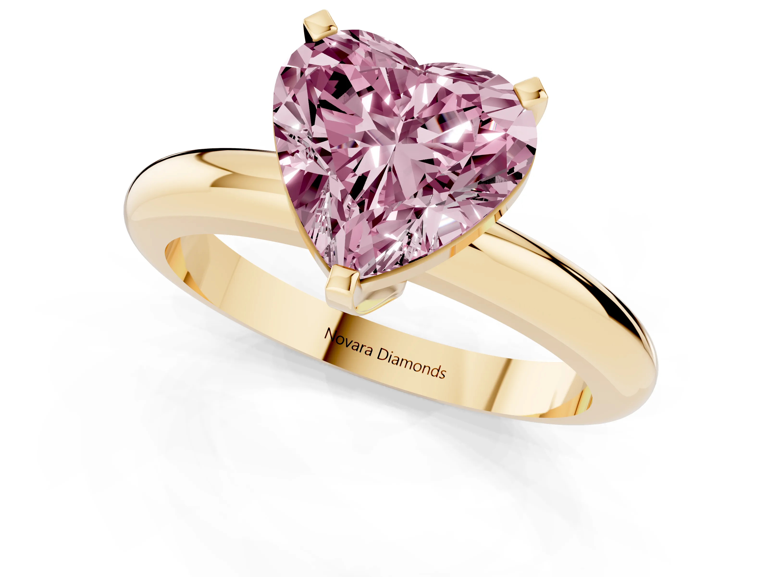 Fancy Pink Heart Cut Diamond Solitaire Engagement Ring Set in Yellow gold with Round Band and Prong Setting