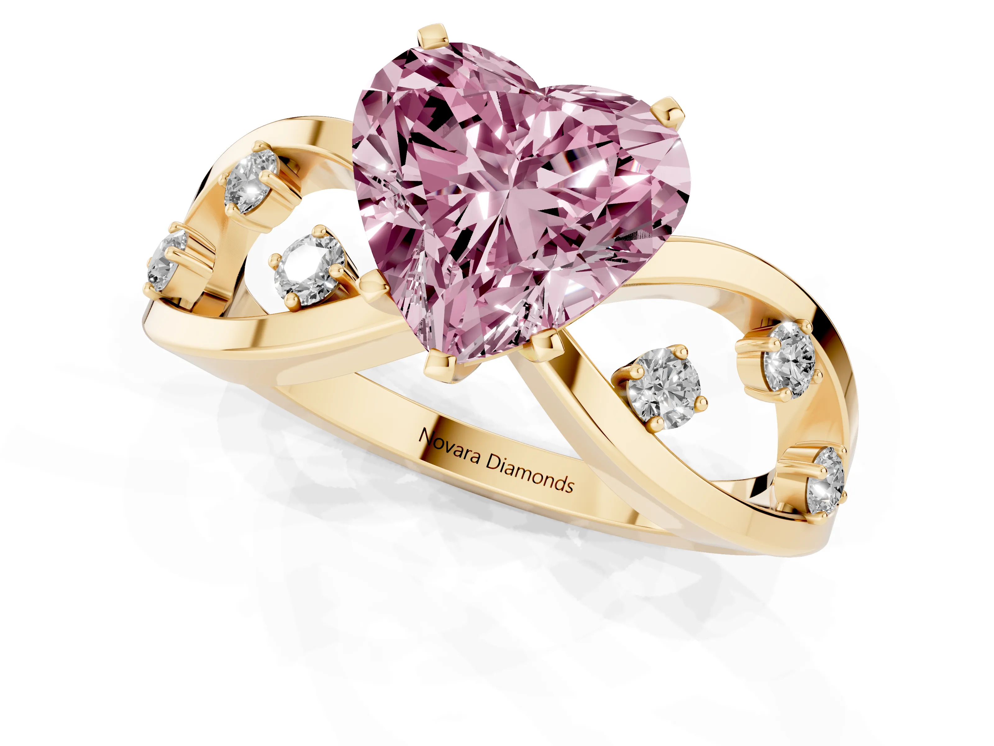 Fancy Pink Heart Cut Diamond Solitaire Ring Set in Yellow gold with Side Stones on Criss-Cross Band and Prong Setting