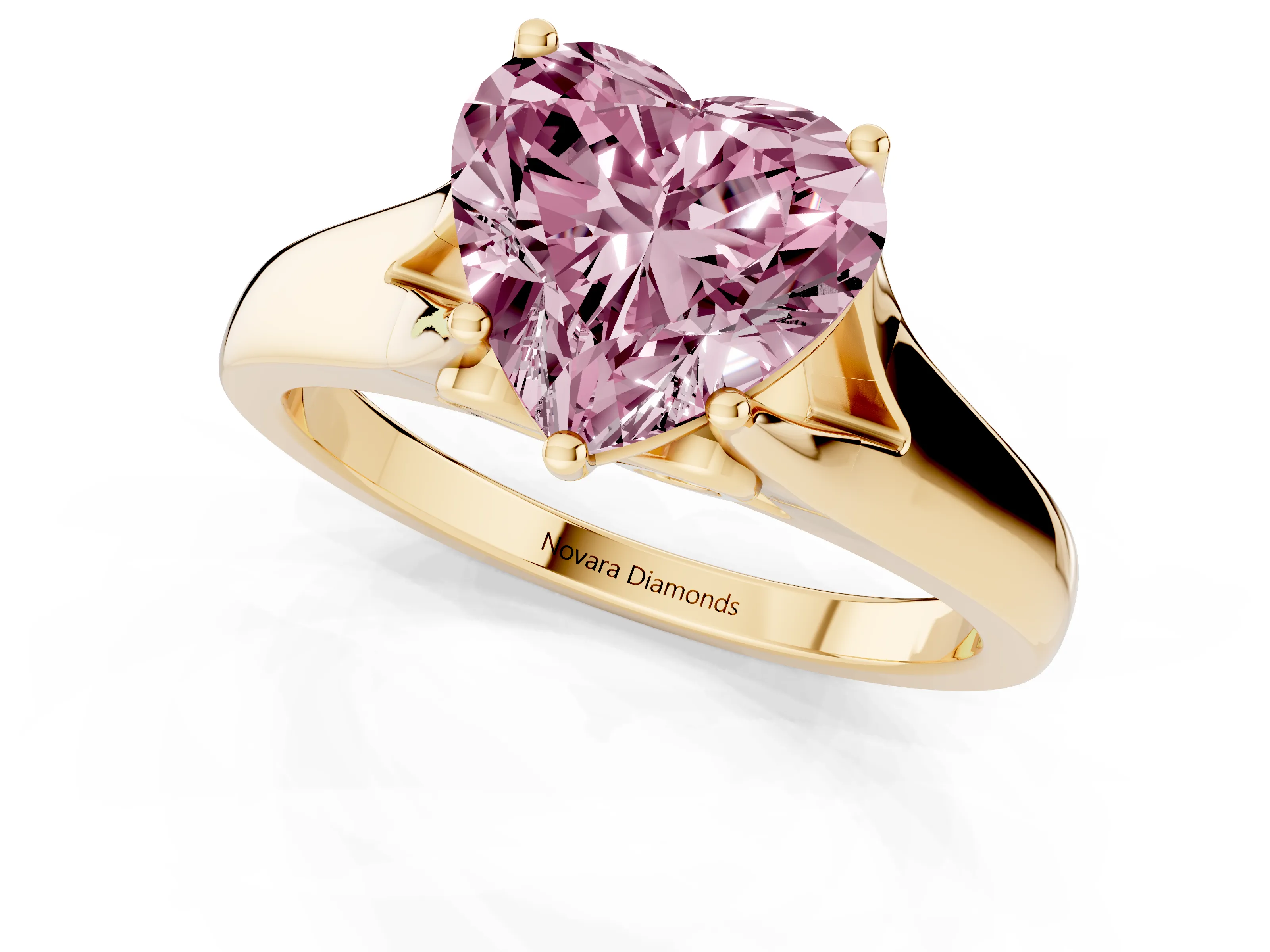 Fancy Pink Heart Cut Diamond Solitaire Ring Set in Yellow gold with Arched Cathedral Band and Prong Setting