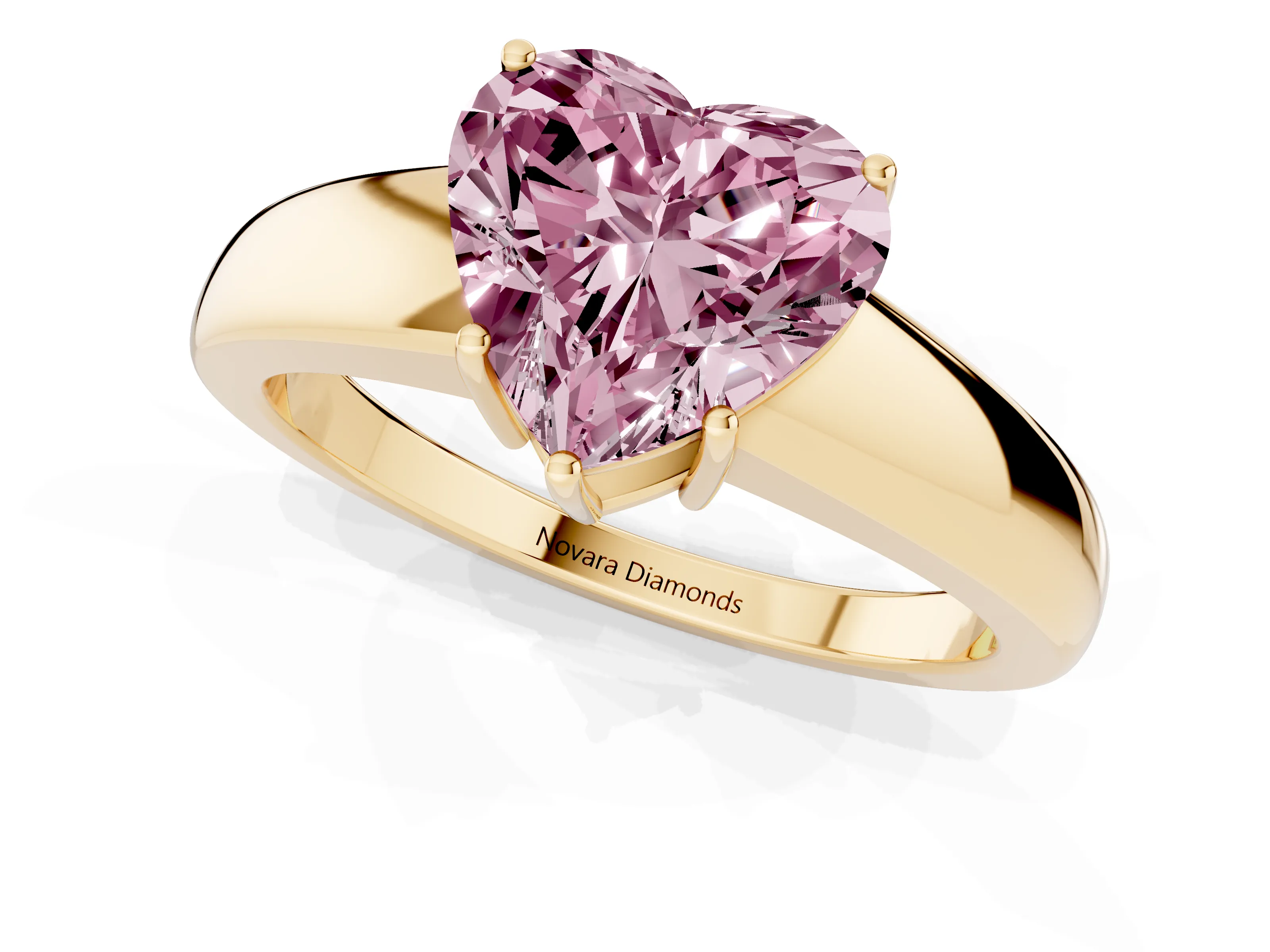 Fancy Pink Heart Cut Diamond Solitaire Ring Set in Yellow gold with Tapered Band and Prong Setting