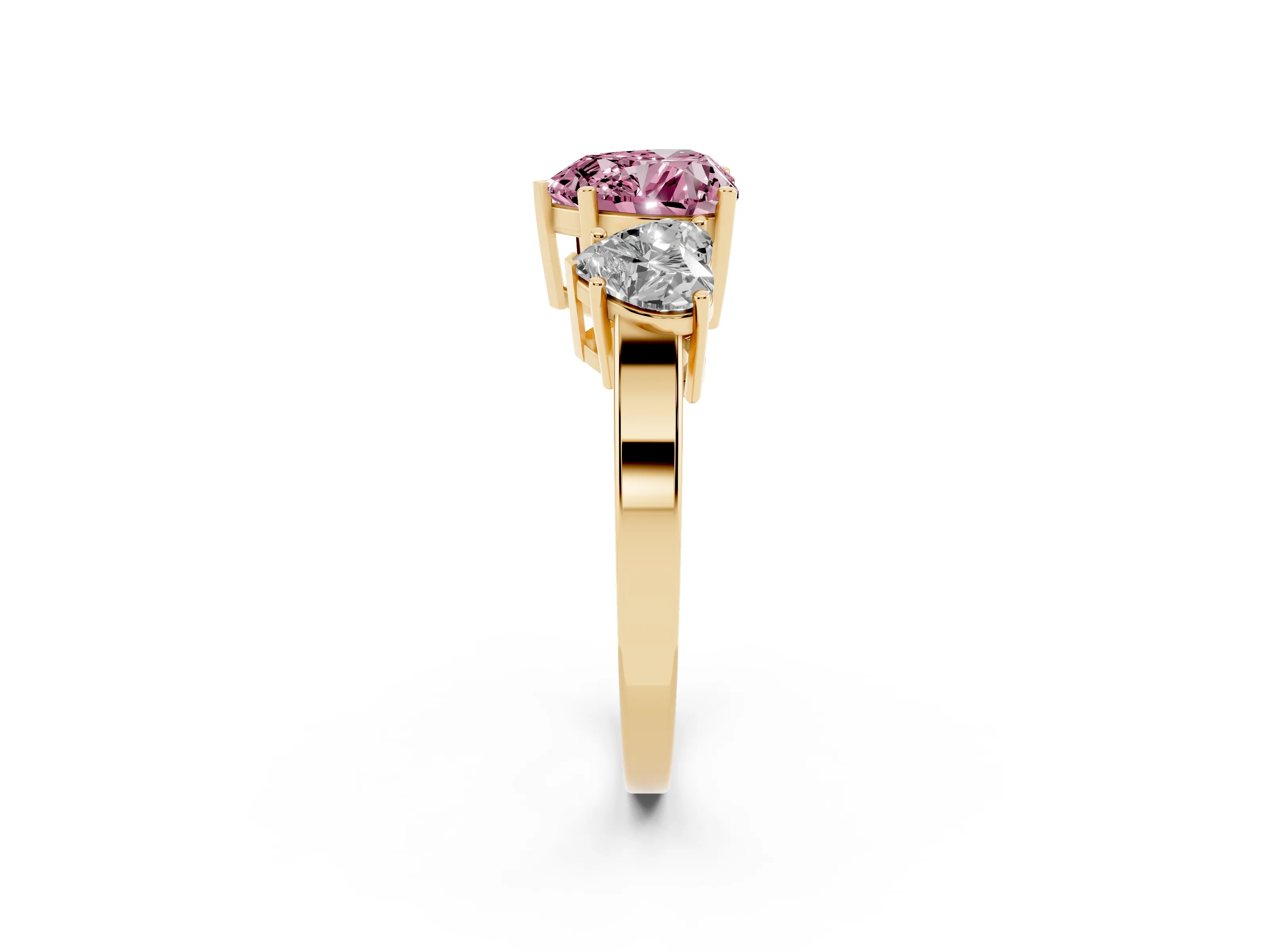 Fancy Pink Heart Cut Diamond Three-Stone Engagement Ring Set in Yellow gold with Flat Band