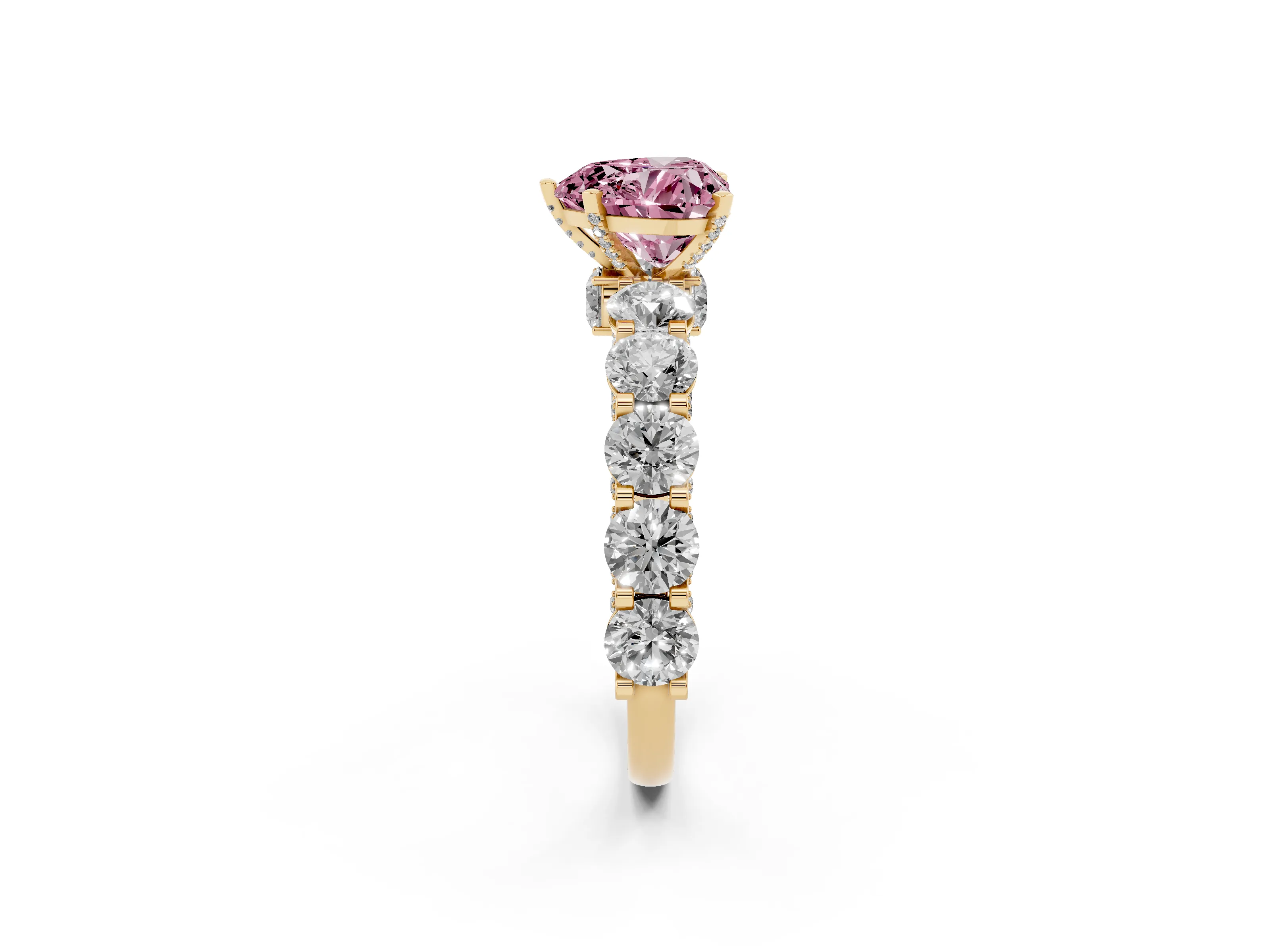 Fancy Pink Heart Cut Diamond Side Stone Ring Set in Yellow gold with Alternating Round and Oval Side Stones